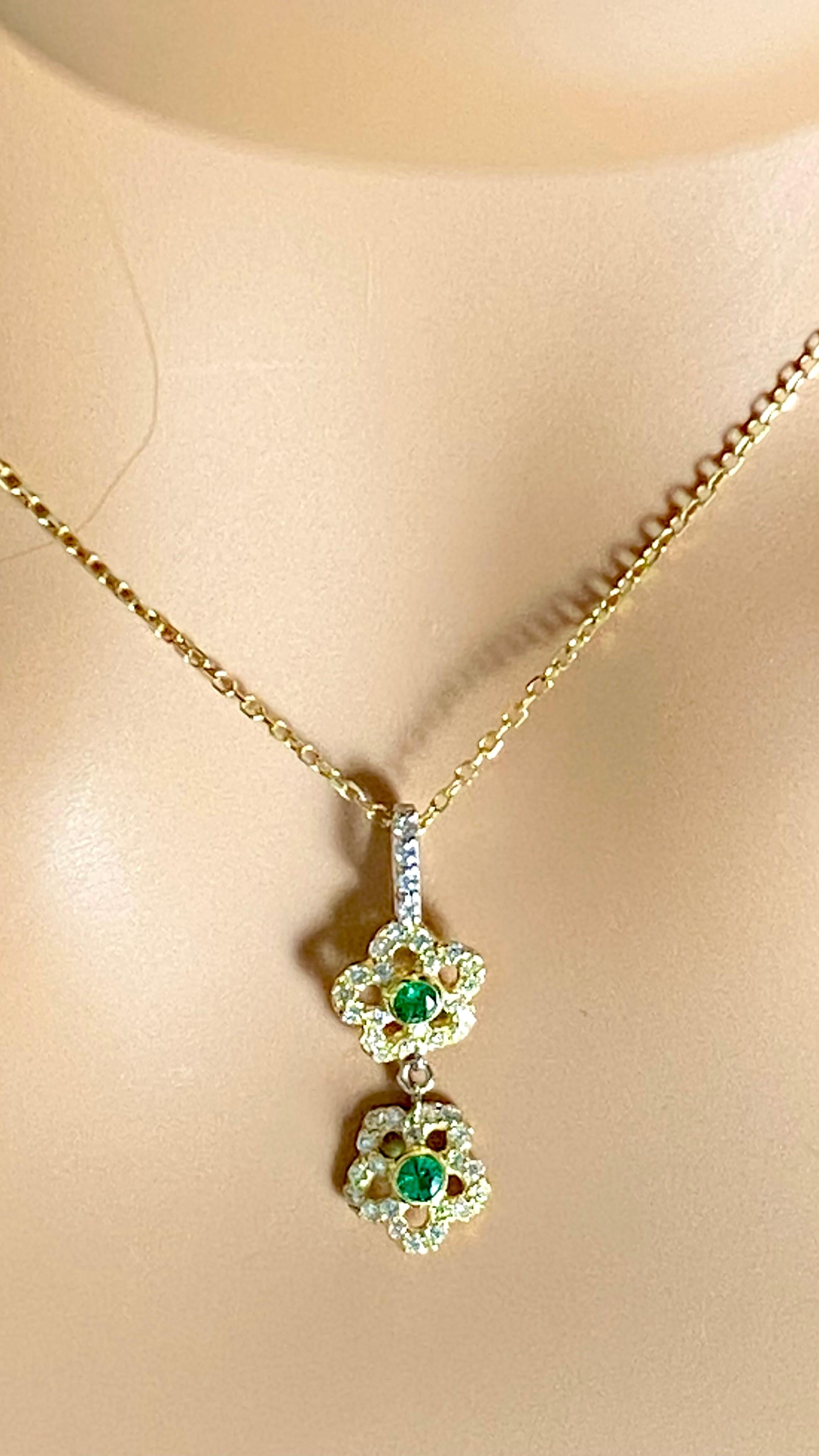 14 Karat Yellow White Gold Floral Pendant Necklace with Emeralds and Diamonds For Sale 3