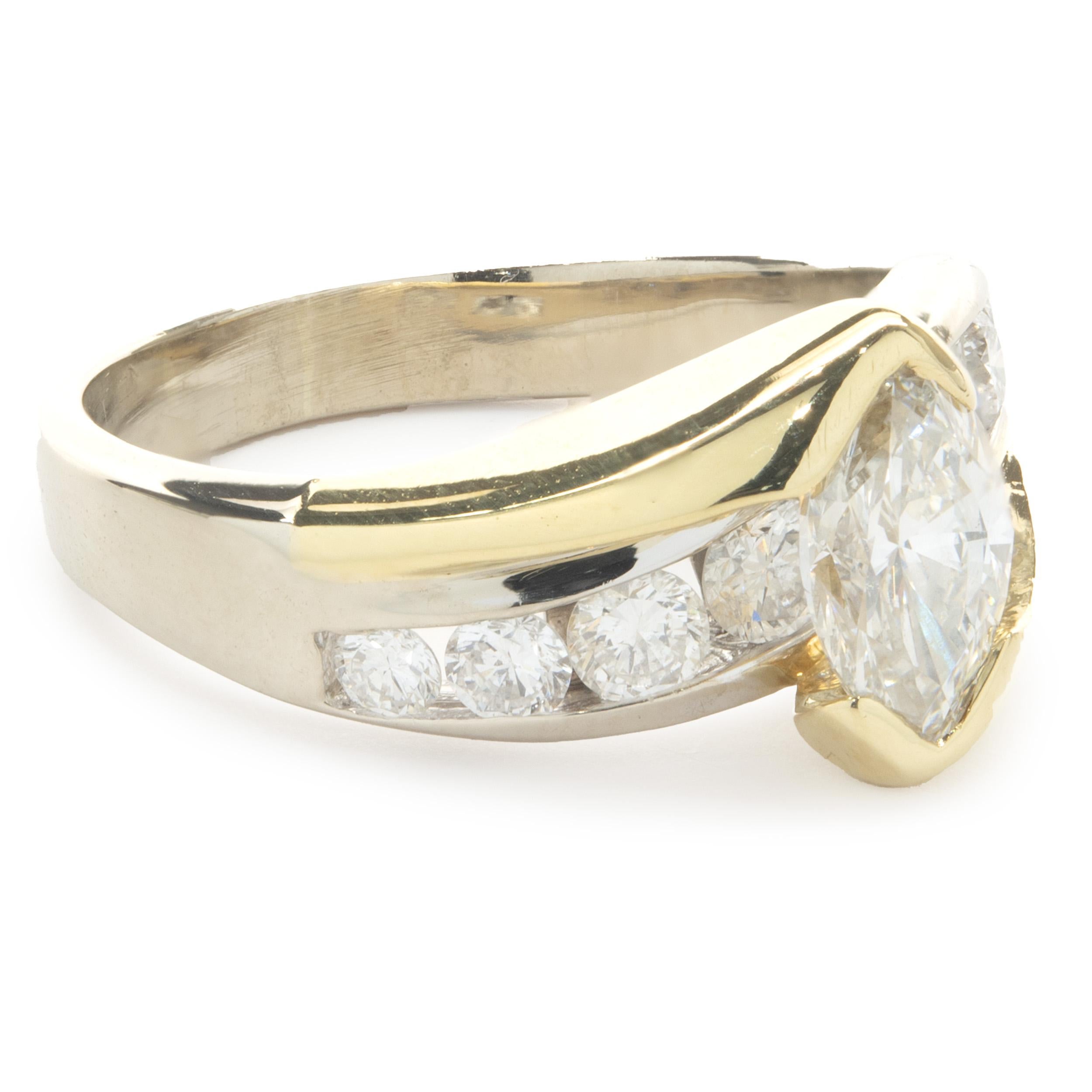 Designer: kundenspezifisch
MATERIAL: 14K Gelb- und Weißgold
Diamant: 1 Marquise-Schliff = .70ct
Farbe: K
Klarheit: SI1
Diamant: 8 runde Diamanten im Brillantschliff = 0,24cttw
Farbe: G
Klarheit: SI1
Ringgröße: 6.5 (bitte erlauben Sie zwei