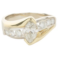 Anello di fidanzamento con diamante taglio marquise in oro giallo e bianco 14 carati