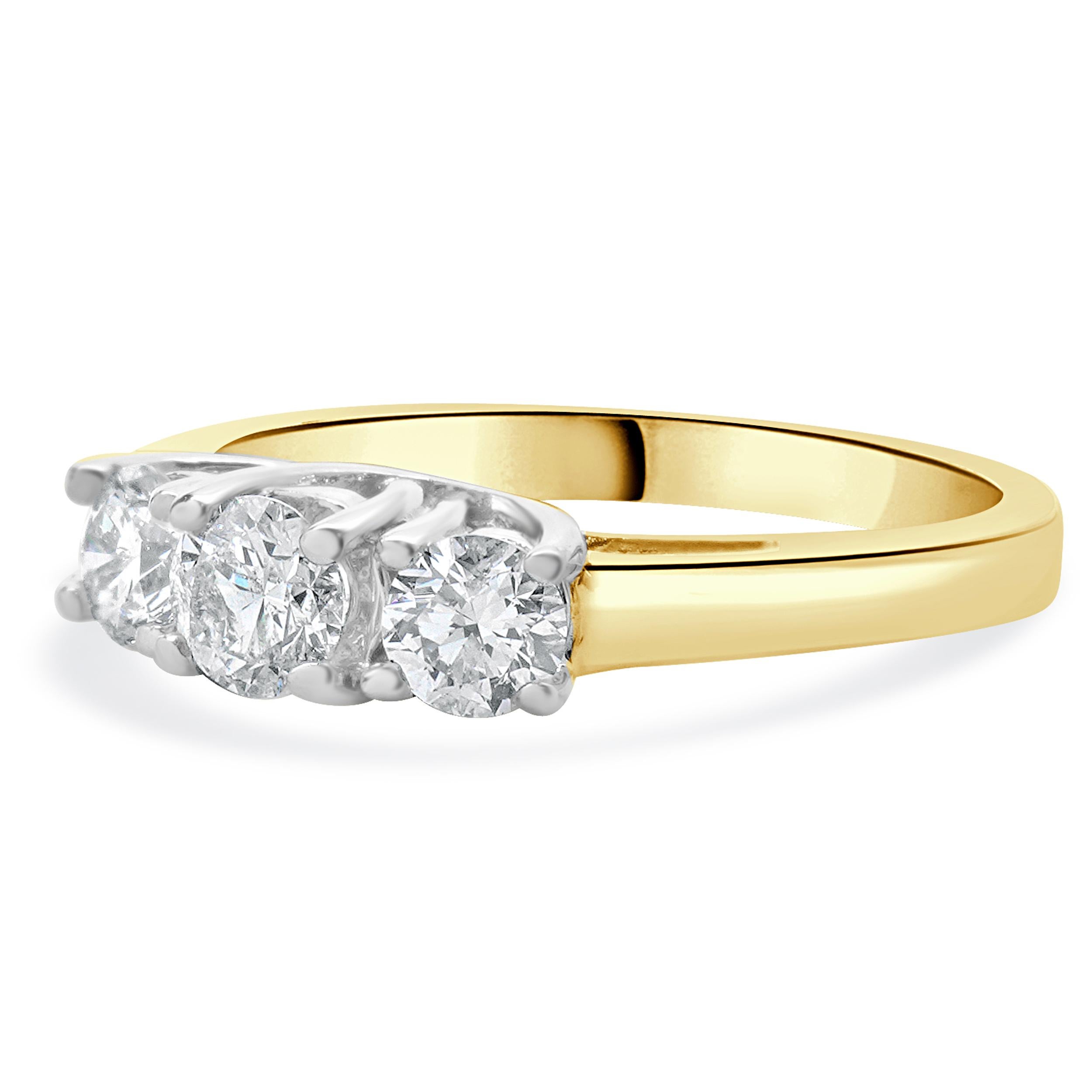 Material: 14K yellow & white gold
Diamond: 3 round brilliant cut = 0.90cttw
Color: G
Clarity: I1
Ring Size: 8.25 (please allow up to 2 additional business days for sizing requests)
Dimensions: ring measures 2.5mm wide
Weight: 4.31 grams
