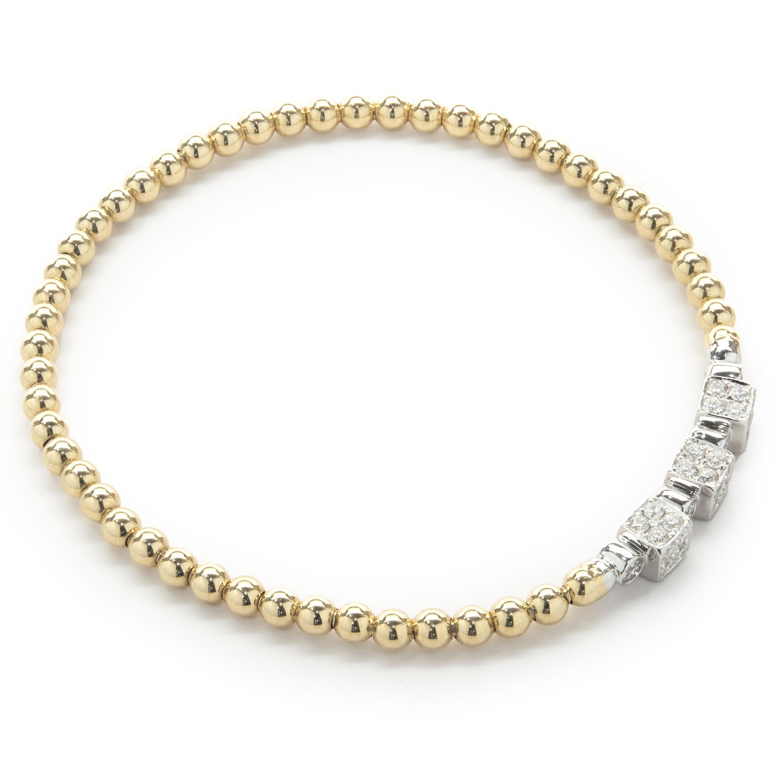 MATERIAL: 14K Gelb- und Weißgold
Diamanten:  runder Brillantschliff = 0,60cttw
Farbe: G 
Klarheit: SI1
Abmessungen: Das Armband passt an ein Handgelenk von bis zu 7 Zoll 
Gewicht: 5,73 Gramm
