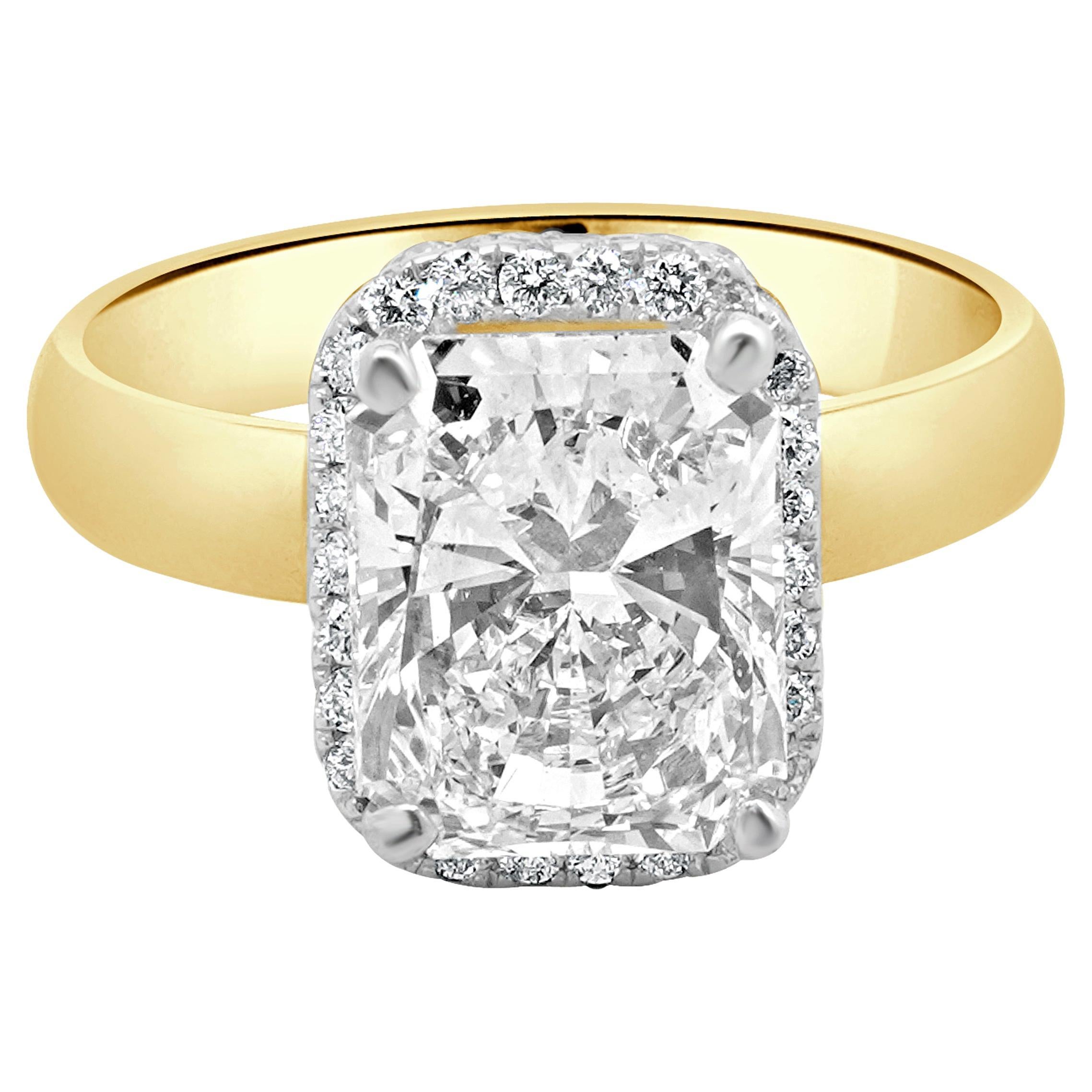 Bague de fiançailles en or jaune et blanc 14 carats avec diamant taille radiant