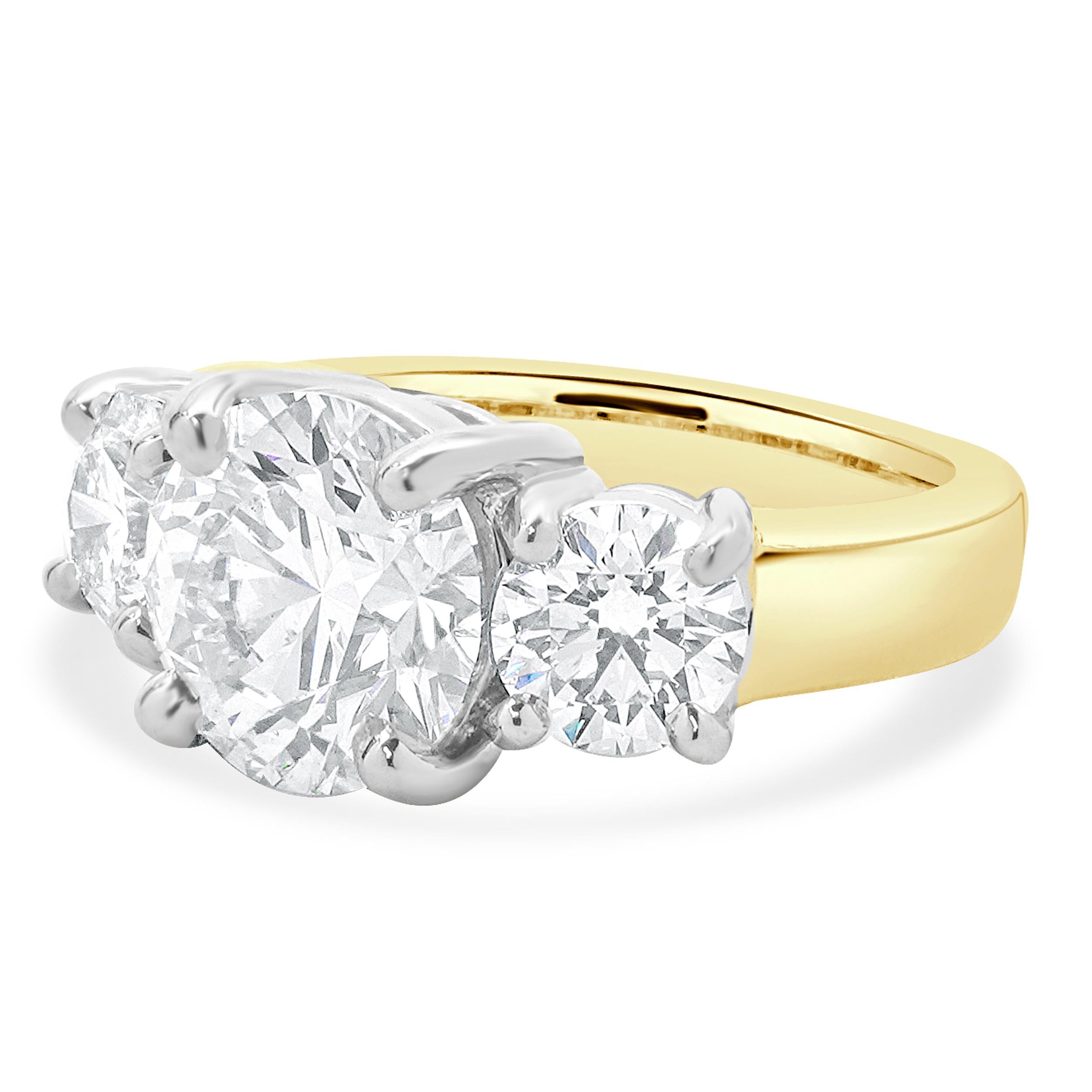 Material: 14K yellow & white gold
Center Diamond: round brilliant = 4.00ct
Color: I
Clarity: SI1
GIA: 15050088
Diamonds: 1 round brilliant cut = 1.02ct
Color: I
Clarity: SI1
GIA: 15142954
Diamonds: 1 round brilliant cut = 1.02ct
Color: I
Clarity: