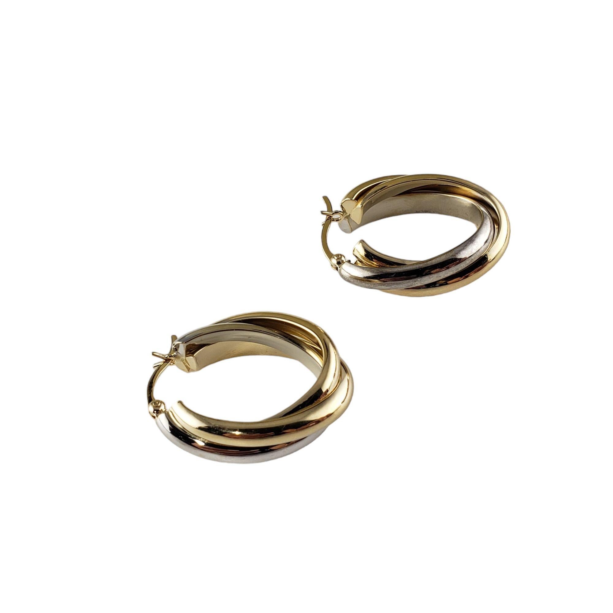 Vintage 14 Karat Yellow/White Gold Twist Hoop Earrings-

These lovely twist hoop earrings are crafted in beautifully detailed 14K yellow and white gold.

Size: 26 mm x 8 mm

Weight: 3.1 gr./ 4.9 dwt.

Stamped: 585

Very good condition,