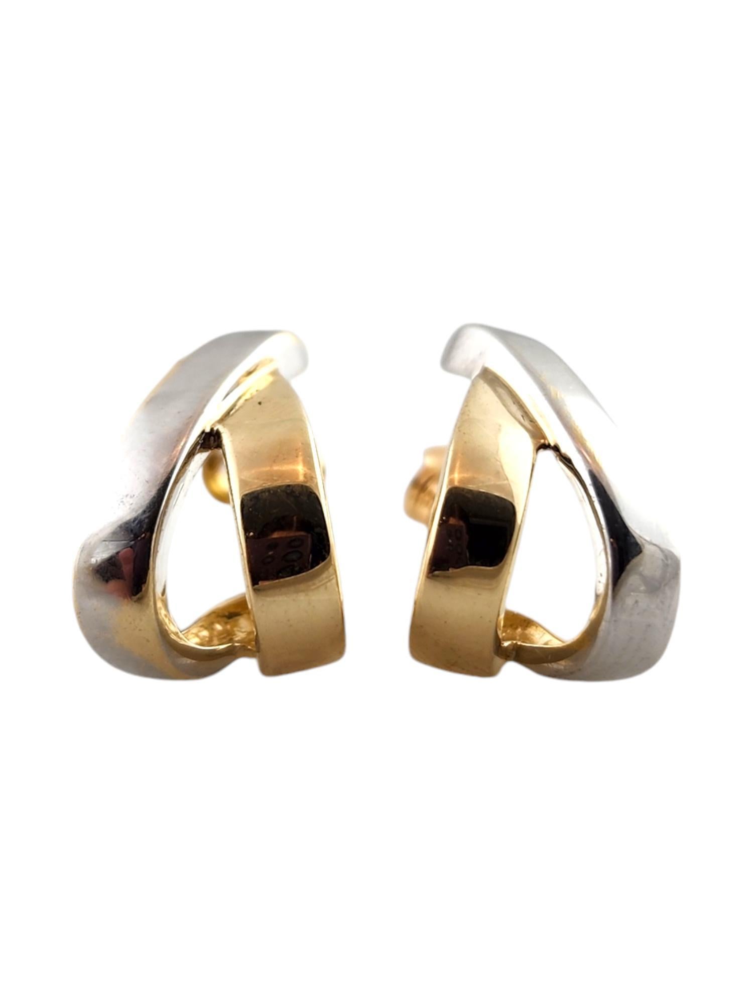14 Karat Yellow & White Gold Two Tone Cross Over Earrings

This gorgeous set of two-tone earrings were meticulously crafted from both 14K white and yellow gold!

Size: 15.6mm X 10.5mm x 10.9mm

Weight: 2.48 dwt/ 3.85 g

Hallmark: C 14K CJI

Very