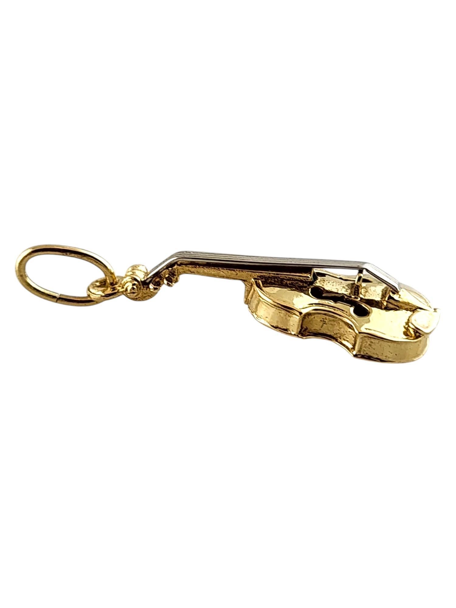 14 Karat Yellow & White Gold Violin Charm

This adorable violin charm was crafted from 14K yellow gold with beautiful 14K white gold detailing!

Size: 30.17mm X 10.14mm X 6.02mm

Weight: 3.2 g/ 2.0 dwt

Tested 14K

Very good condition,