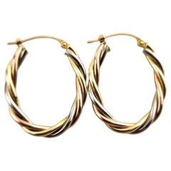 14 Karat Yellow, White
Rose Gold Twisted Oval Tri-Colored Hoop Earrings #18508 14 Karat Yellow, White
Rose Gold Twisted Oval Tri-Colored Hoop Earrings #18508