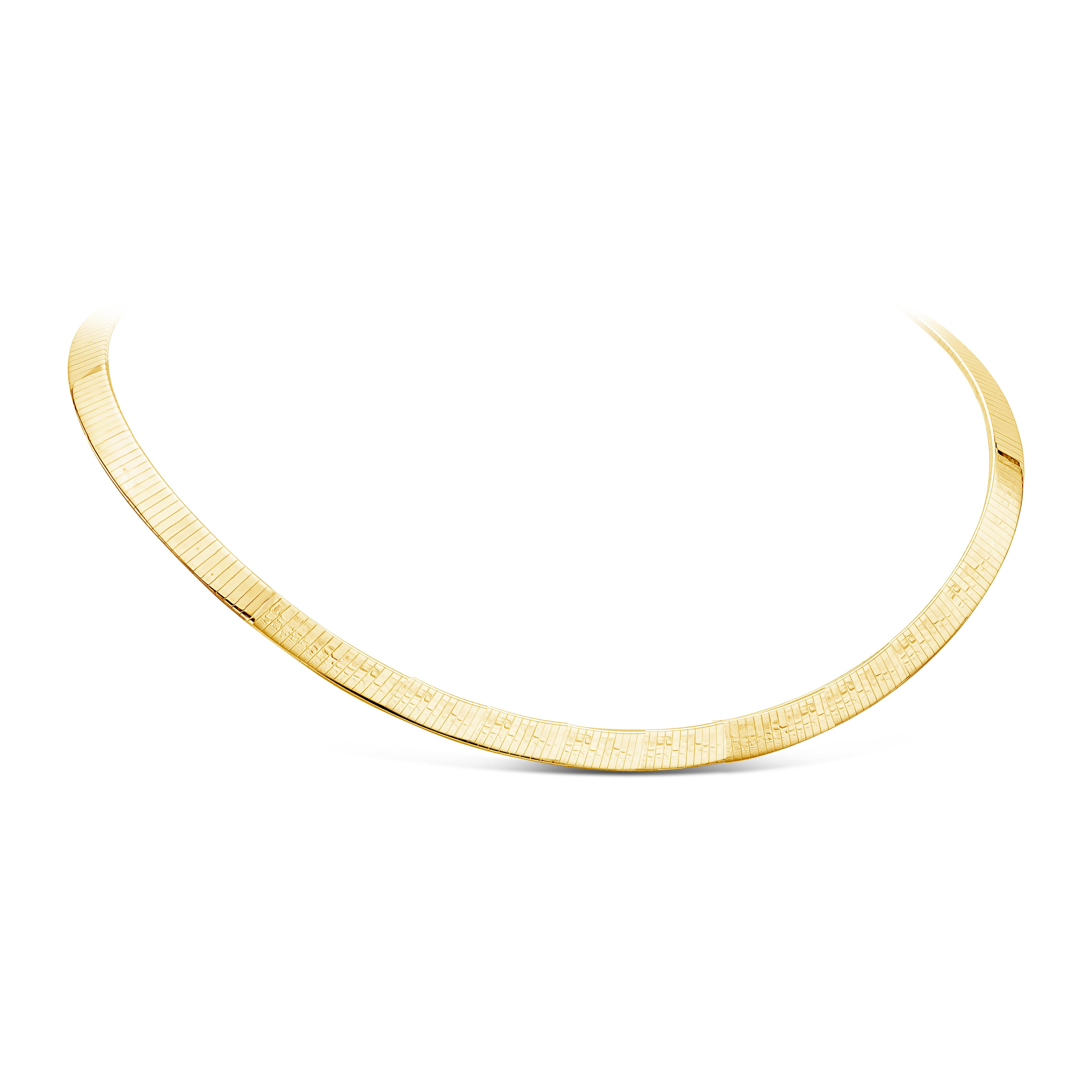 This polished omega chain necklace is 16 inches in length made in 14 karats yellow gold and weighs 37.84 grams.

6mm wide

1.50mm thick