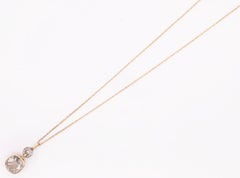 14 Karat Gold Necklace with Round Sapphire and Diamond Pendant