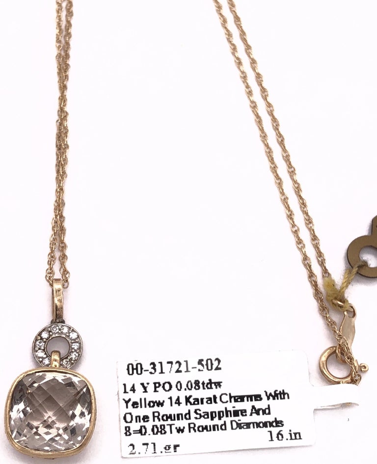 14 Karat Gold Necklace with Round Sapphire and Diamond Pendant For Sale
