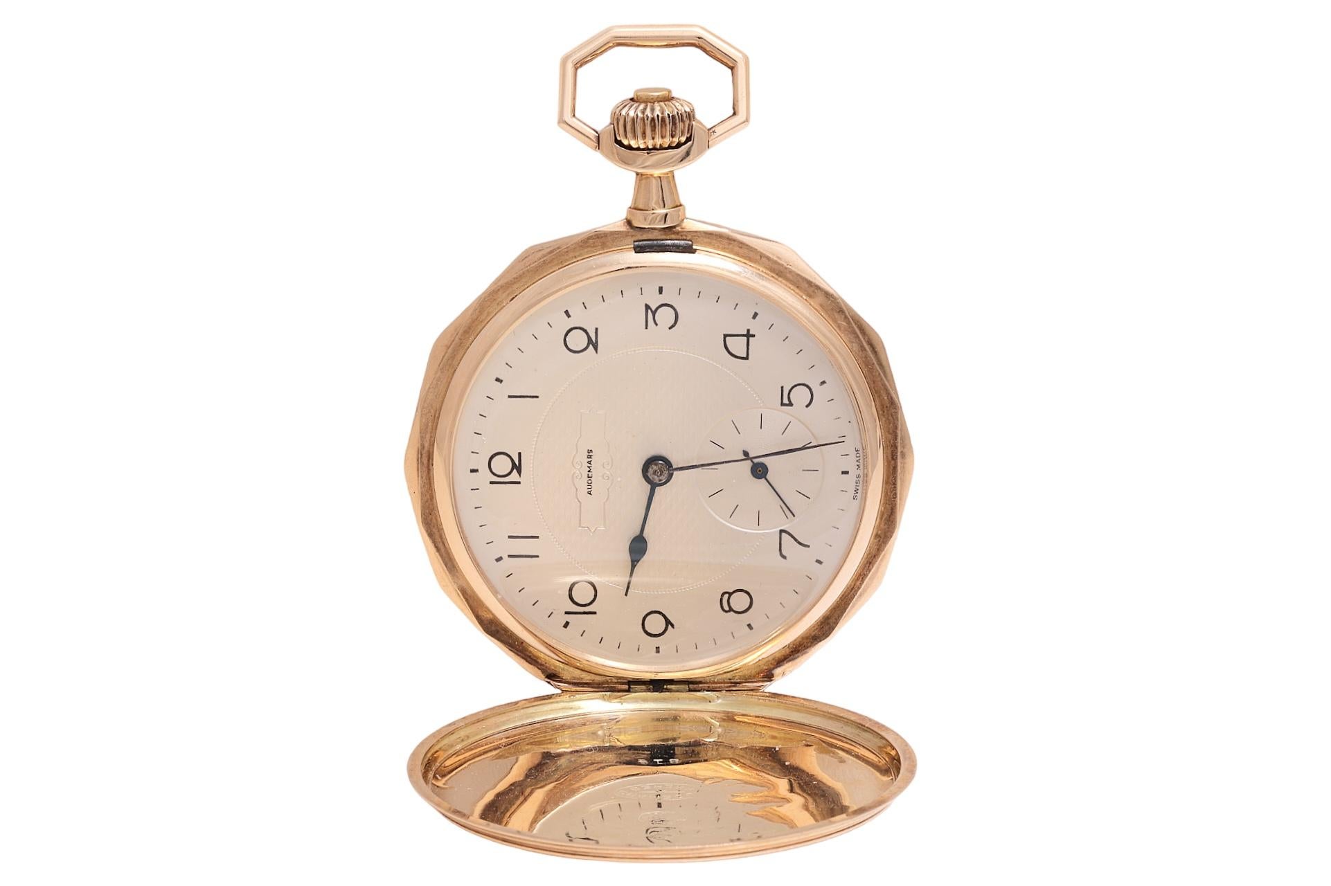 14 Kt Gold Audemars Frères Genève Pocket Watch

Case: Measurements diameter 52 mm thickness 8.5 mm

Total weight: 76.4 gram / 2.695 oz / 49.1 dwt

Audemars Frères was a Swiss watch manufacturer founded by brothers Charles-Henri Audemars and Hector