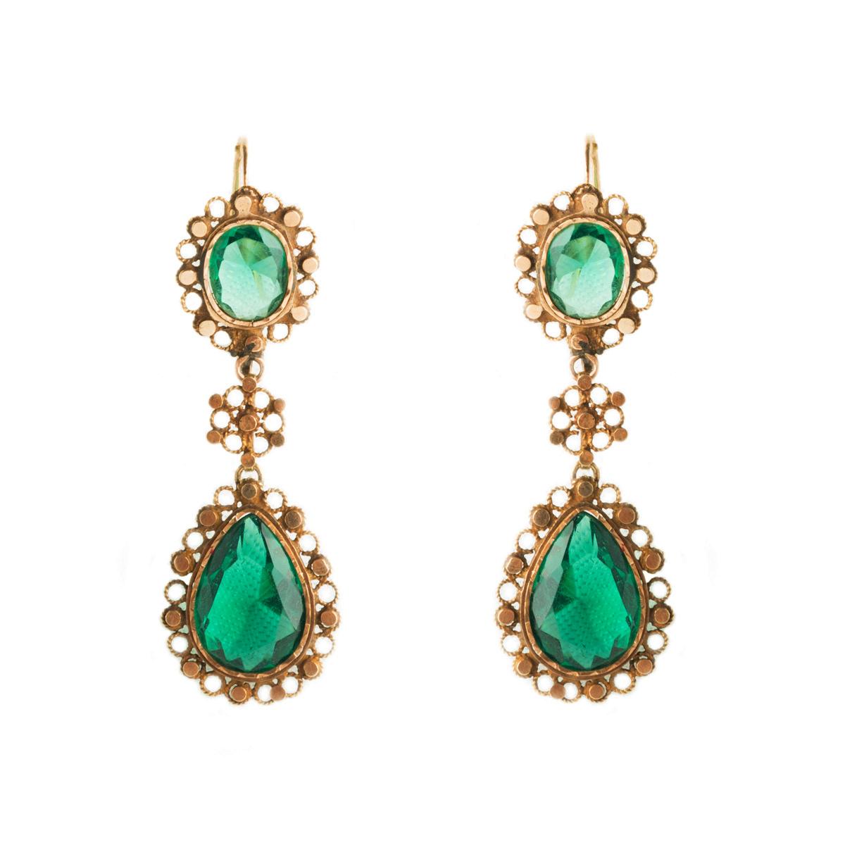 Fascinating 14 kt gold pendant earrings with green glass pastes from the early 1900s, Sicily. Since ancient times, earrings have been a precious ornament, they were a much-loved accessory, and this made their use more and more widespread. Sicilian