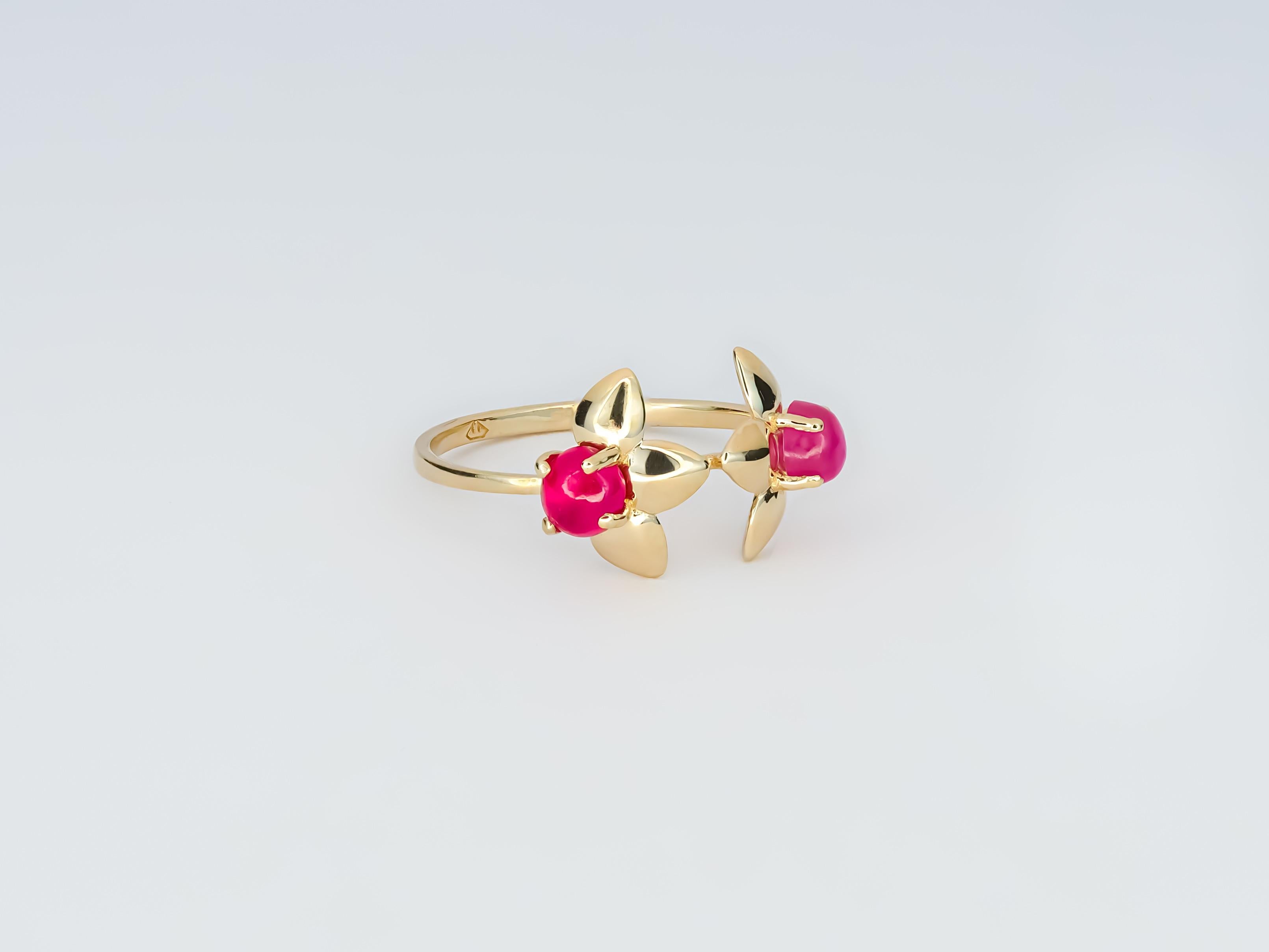 14 karat gold ring with 2 genuine rubies. Flower gold ring. July birthstone.
Weight: 1.50 g.
Size: 17 mm. (US - 7, EU - 54, UK - M 1/2)
Gemstones: 2 genuine rubies
Weight: 0.45 ct x 2 pieces, 0.90 ct total
Cabochon cut, color - red and rose
Clarity: