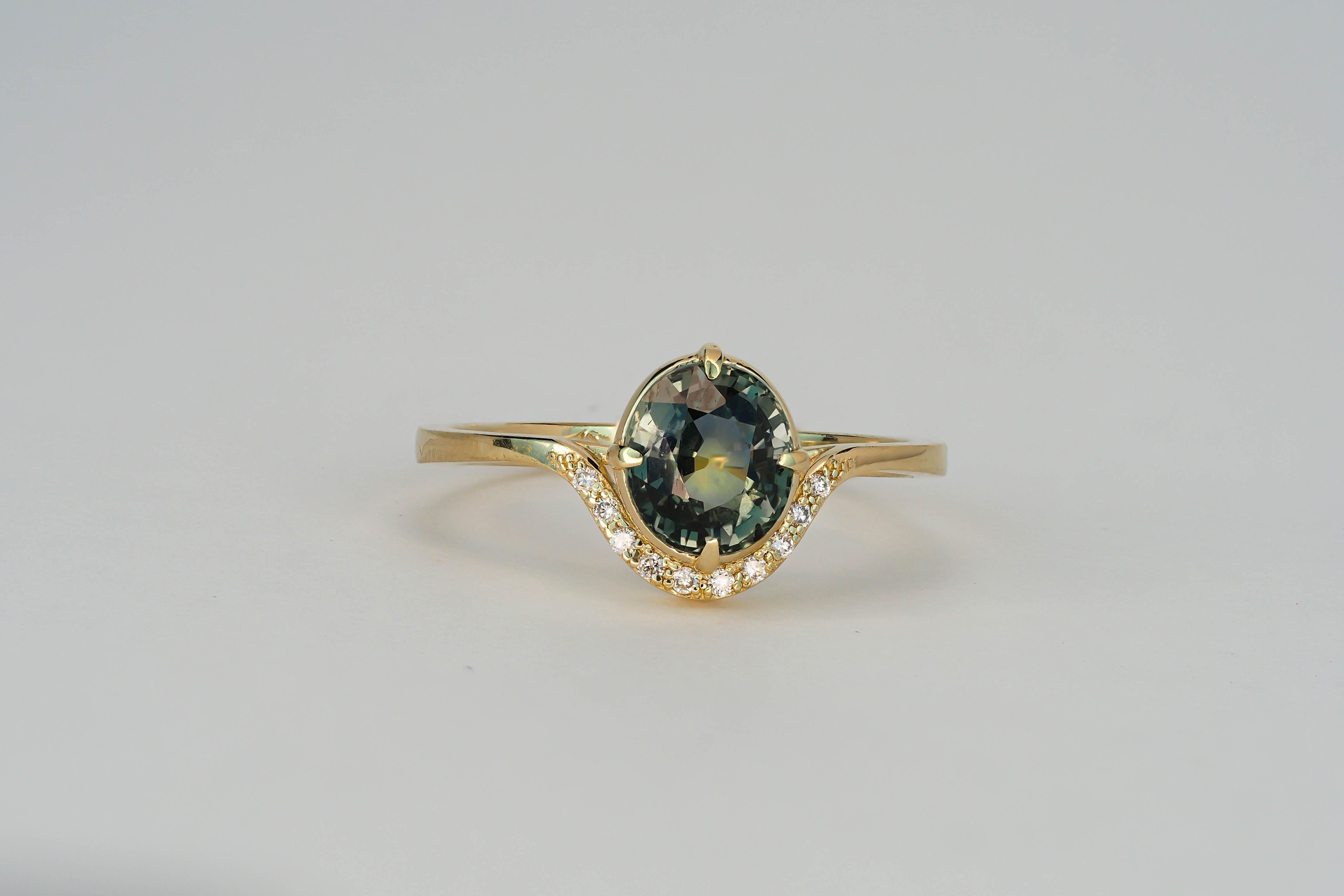 Oval Cut 14 Kt Gold Ring with Sapphire and Diamonds