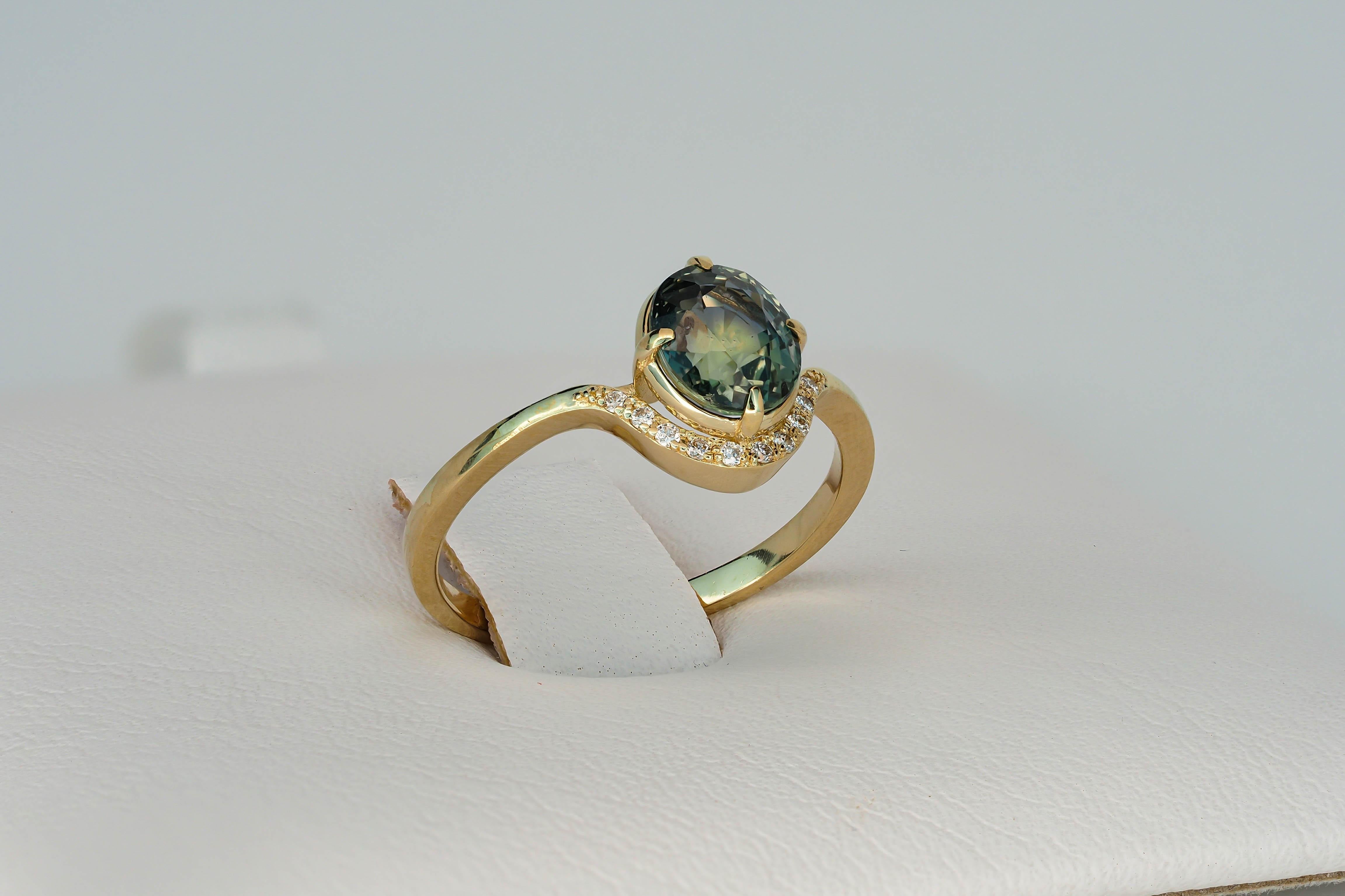Women's 14 Kt Gold Ring with Sapphire and Diamonds