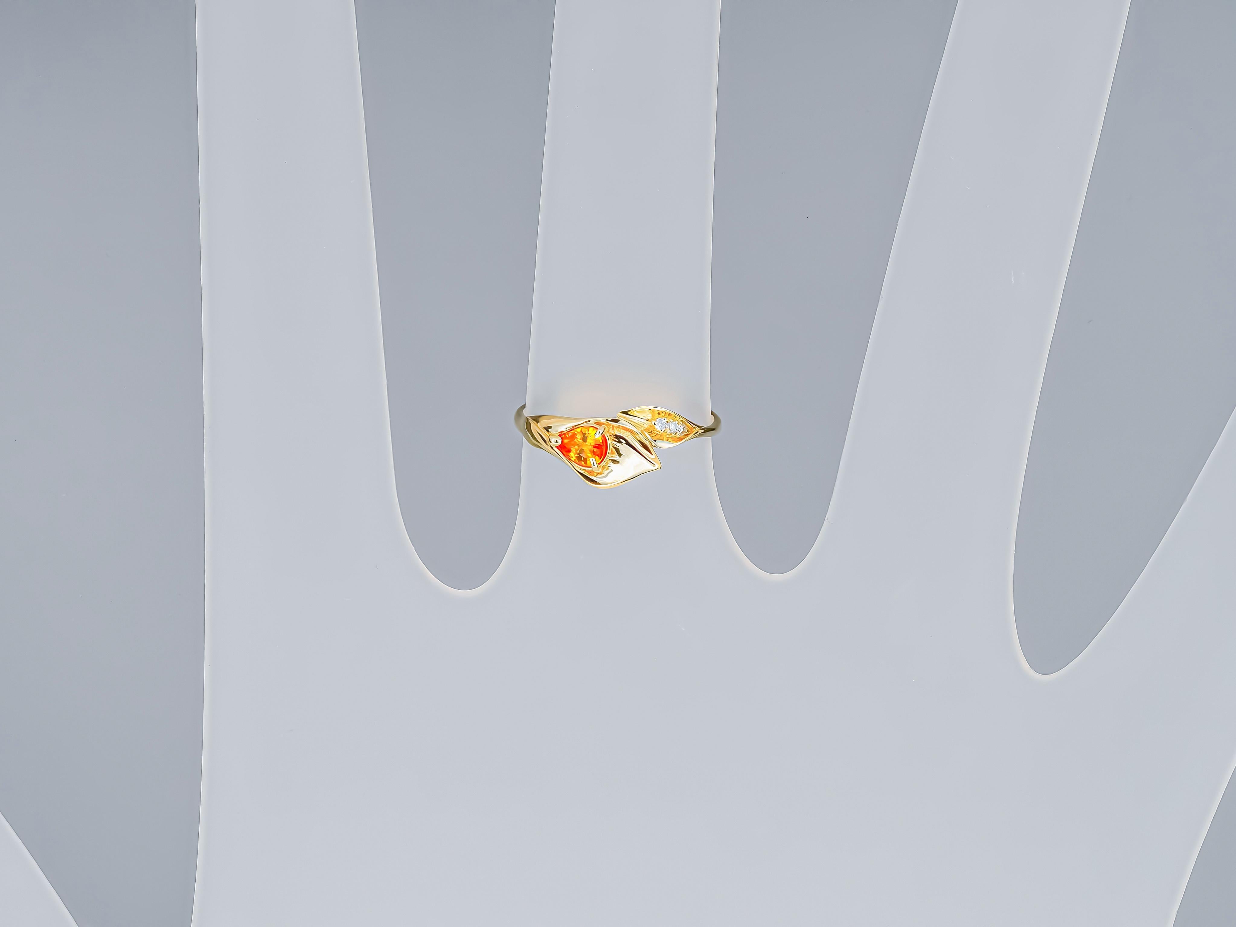 14 kt gold ring with sapphire and diamonds. Lily calla gold ring.
Weight: 1.80 g.
Central stone: Sapphire
Weight: 0.70 ct.
Yellow color, pear cut.
Clarity: Transparent with inclusions
Surrounding stones:
Diamonds: 3 pieces x 0.0 1ct = 0.03 ct, G/VS,