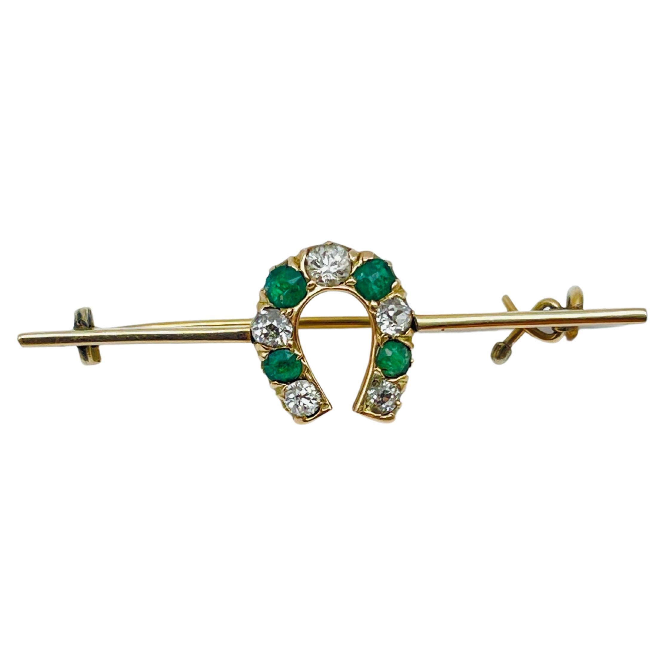 14 Kt Horseshoe Bar Brooch with Diamonds Emerald