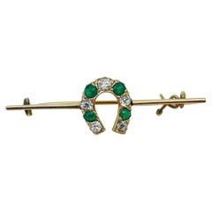 Vintage 14 Kt Horseshoe Bar Brooch with Diamonds Emerald