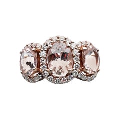 14 Kt Rose Gold 2.75ct. Morganite and .75ct Diamond Halo Ring (10mm wide)