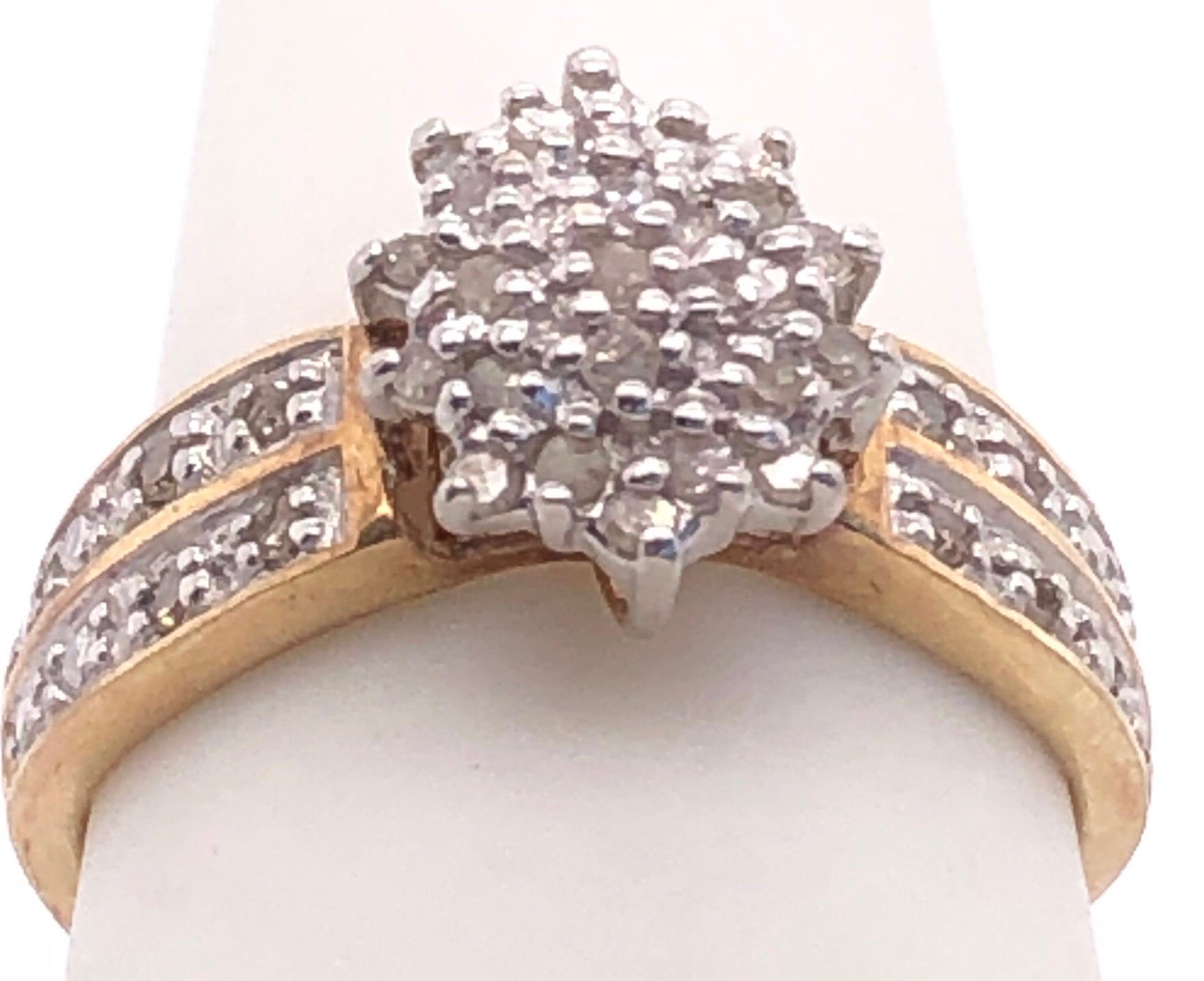 14 karat gold diamond cluster ring