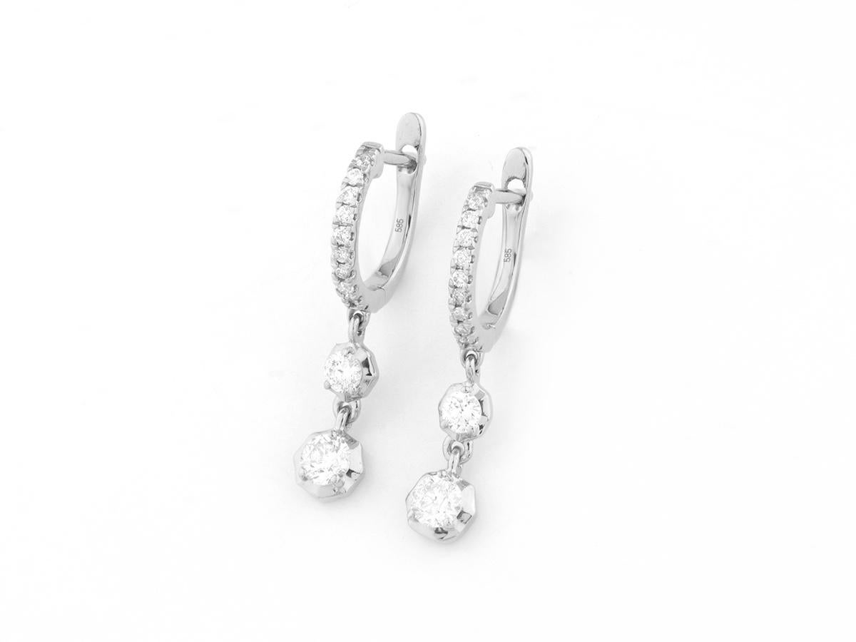 Materiale:  Oro bianco 14KT
Peso dell'oro: 1,68 grammi
Dimensione dell'orecchino: 1cmX2cm
Incastonato con : Diamante 
A. Stone : 22 diamanti naturali

Carati di diamante: 0,44
Colore del diamante :  GH
Chiarezza del diamante :  SI
Taglio del