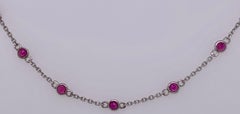 14 Karat White Gold Oval Link Necklace with Garnet Stones