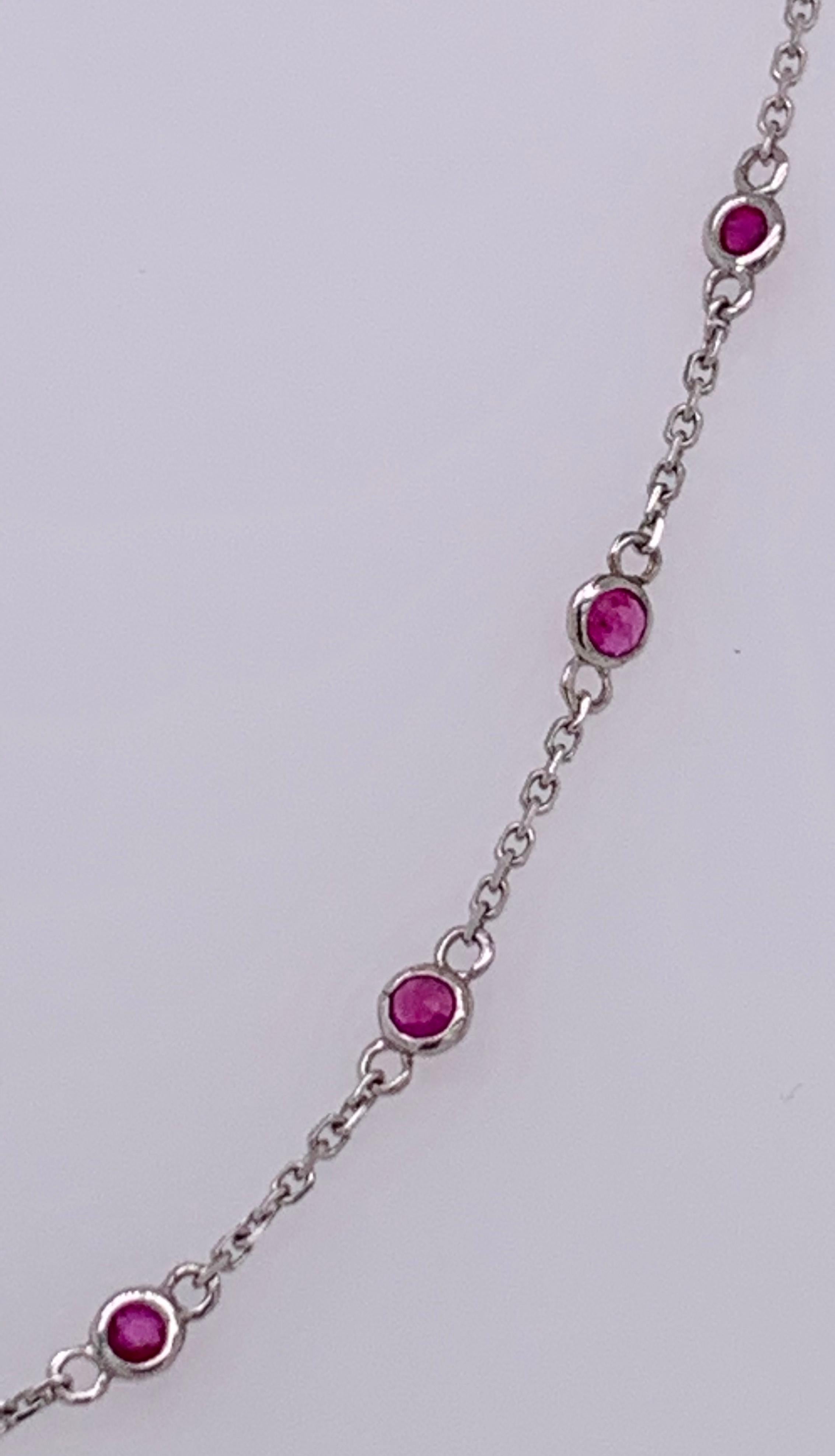 Round Cut 14 Karat White Gold Oval Link Necklace with Garnet Stones For Sale