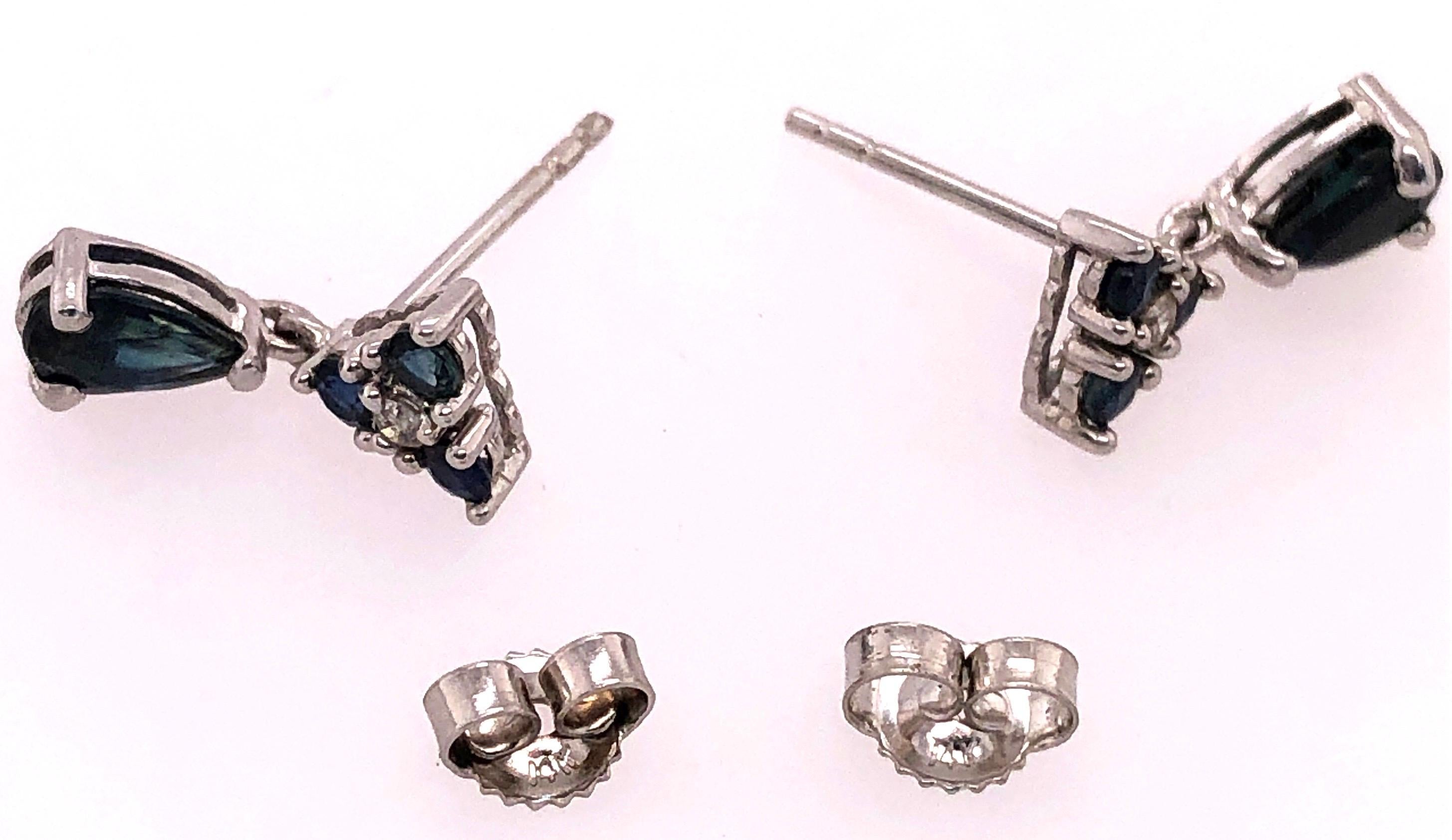 Women's or Men's 14 Karat White Gold and Blue Sapphire Drop Earrings 0.02 Total Diamond Weight For Sale