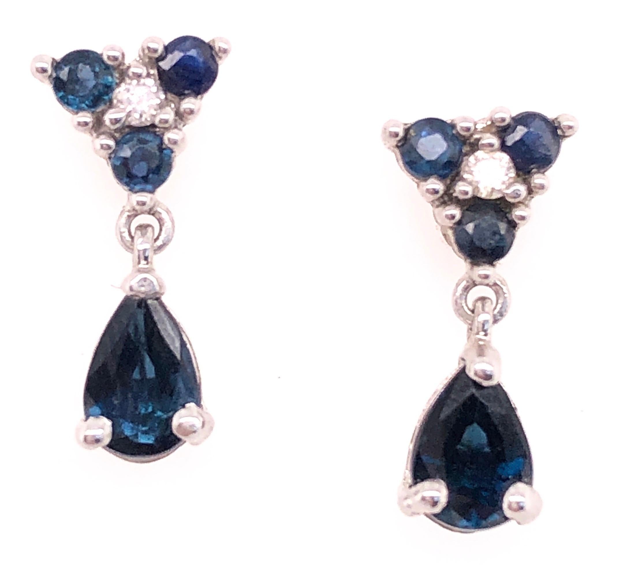 14 Karat White Gold and Blue Sapphire Drop Earrings 0.02 Total Diamond Weight For Sale 1