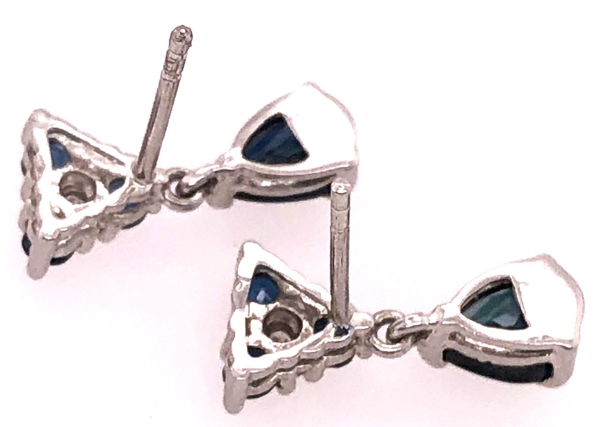 14 Karat White Gold and Blue Sapphire Drop Earrings 0.02 Total Diamond Weight For Sale 3