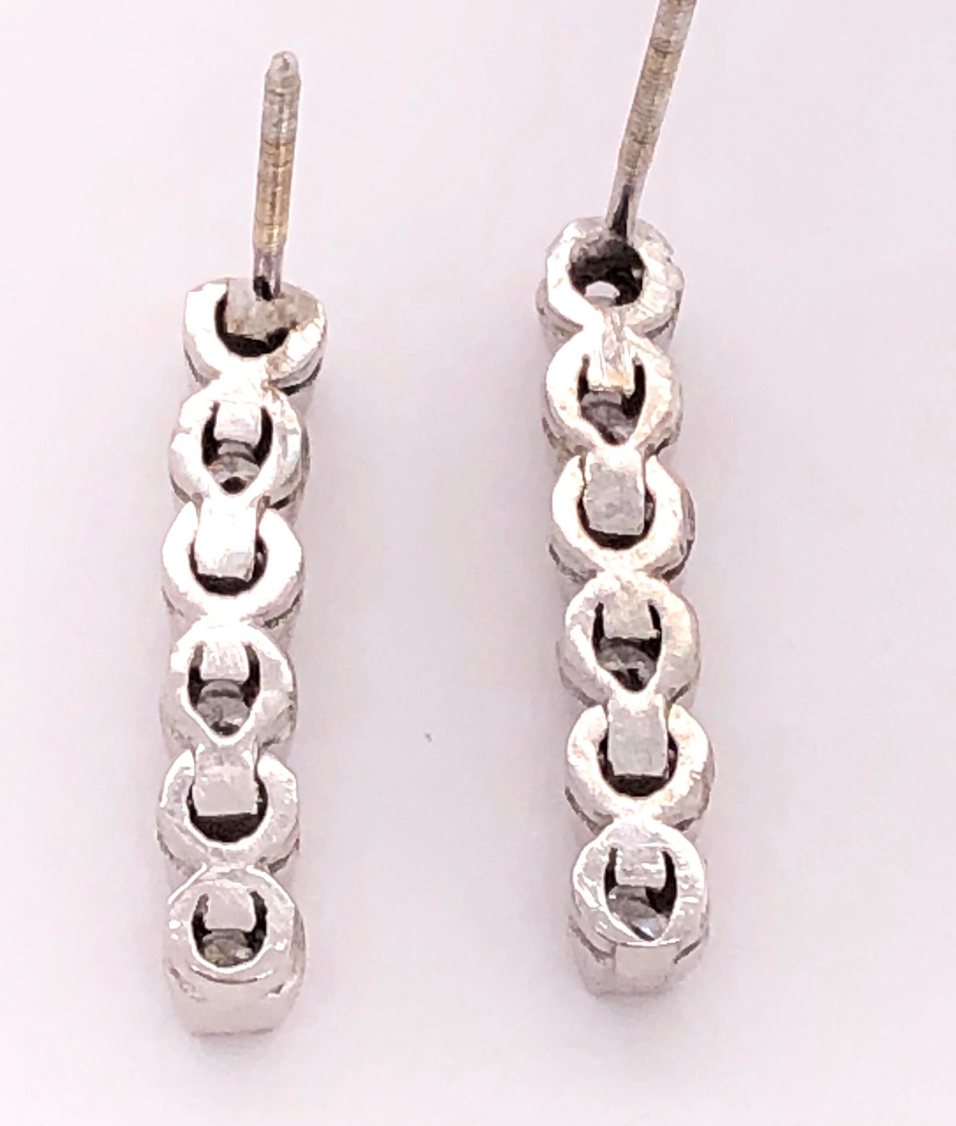 Moderne Boucles d'oreilles en goutte de style libre en or 14 carats et diamants, poids total de 0,75 carat en vente