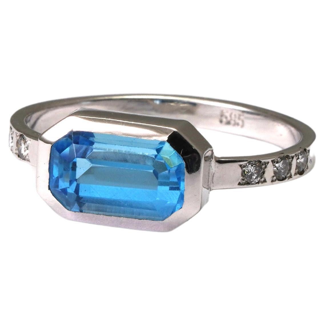 14 kt White Gold Blue Topaz Diamond Ring For Sale