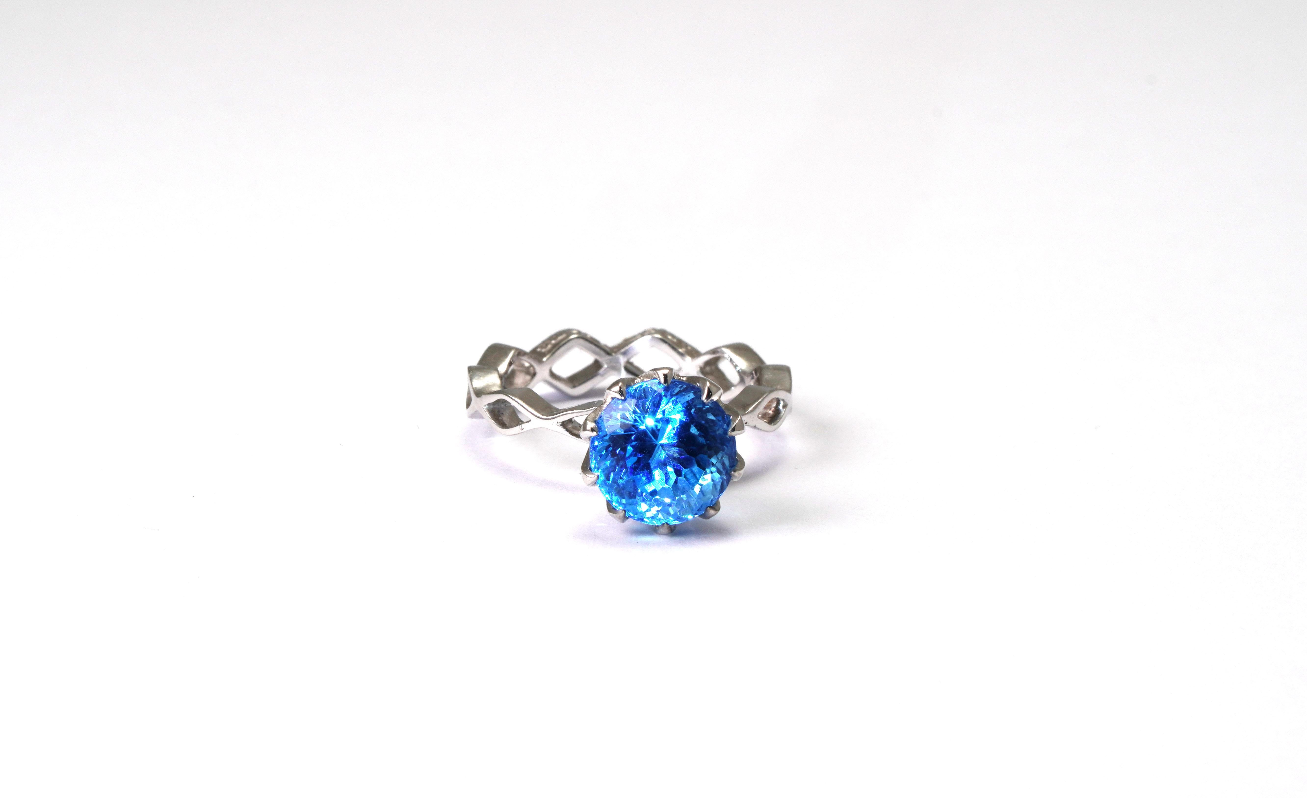 Modern 14 Kt White Gold Blue Topaz Ring For Sale