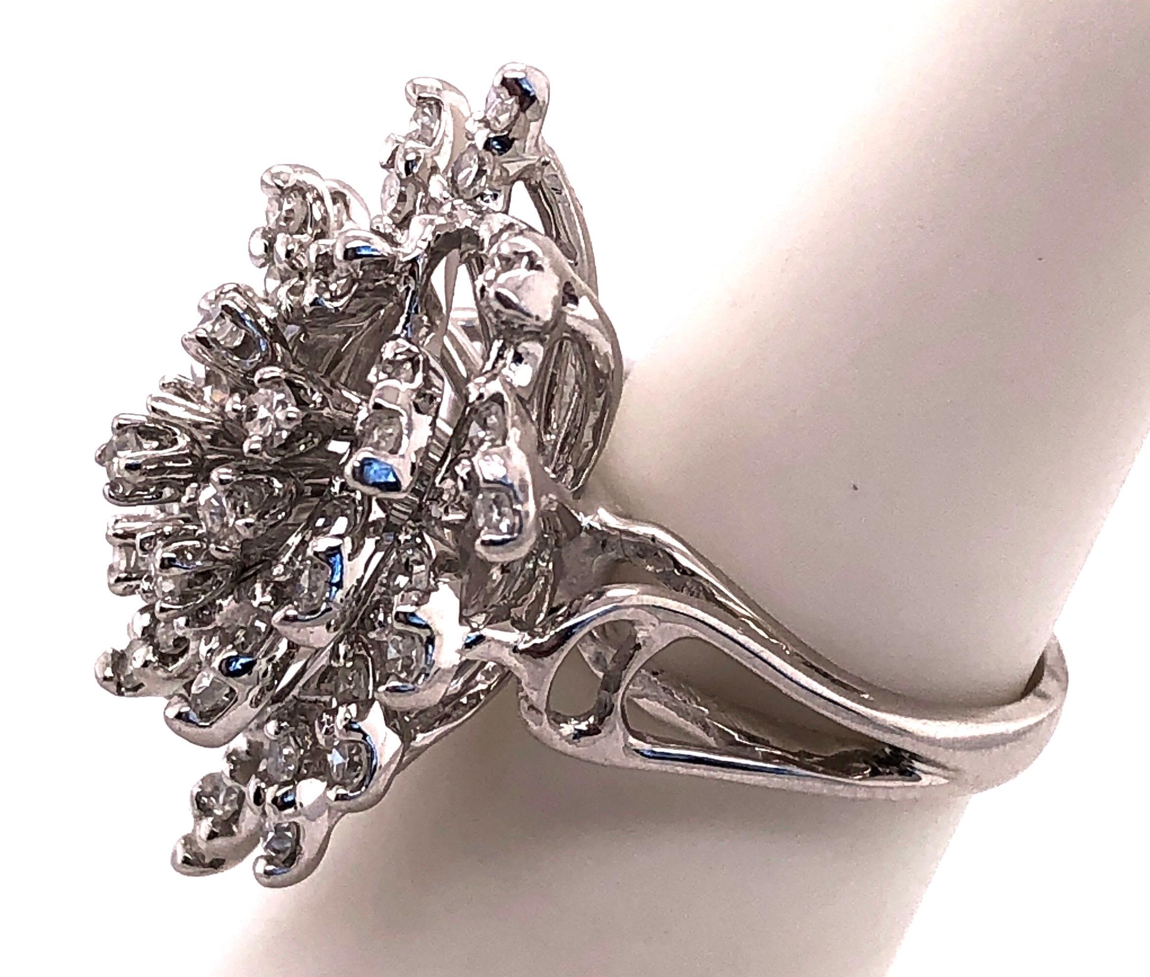 Round Cut 14 Karat White Gold Contemporary Diamond Cluster Ring For Sale