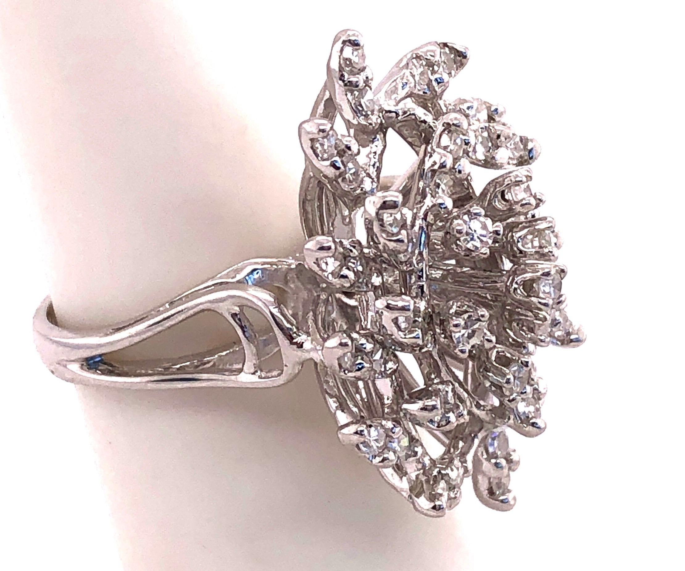 14Kt White Gold Contemporary Ring 2.30 Total Diamond Weight.
Size 5.5 
9.60 grams total weight.