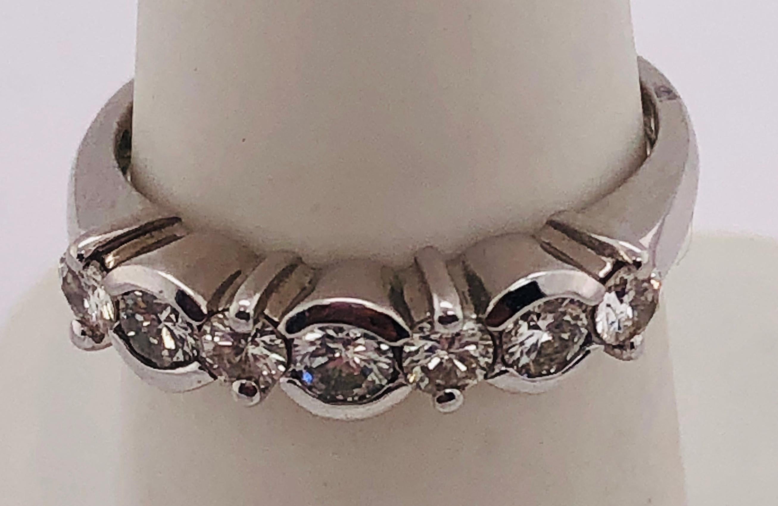 14Kt White Gold Ring with Diamonds 0.75 Total Diamond Weight
Size 5.75
3.05 grams Total Weight