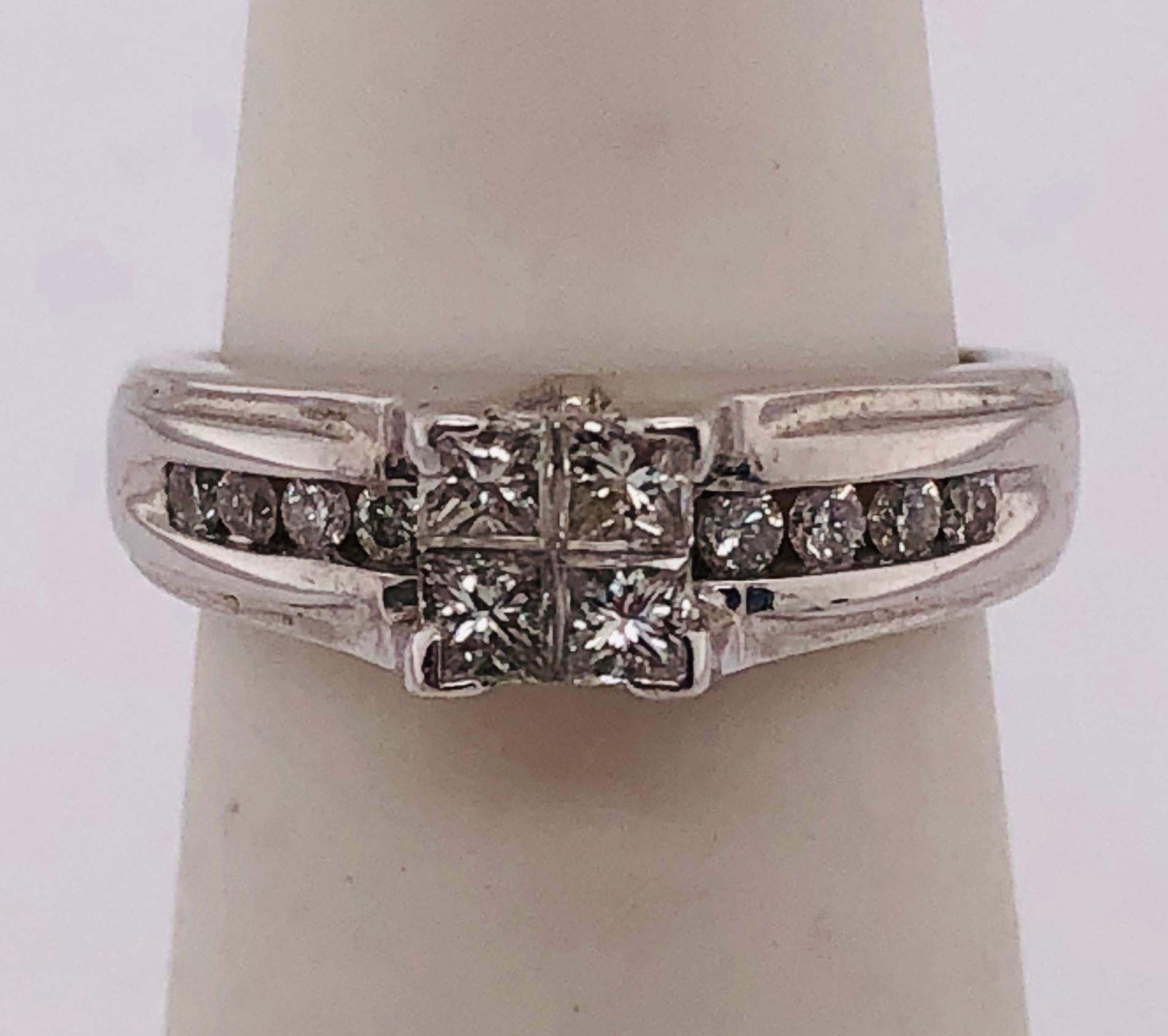 14 Kt White Gold Engagement Bridal Ring with Center Cluster Diamonds 1.00 TDW
Size 5 
4.94 grams total weight