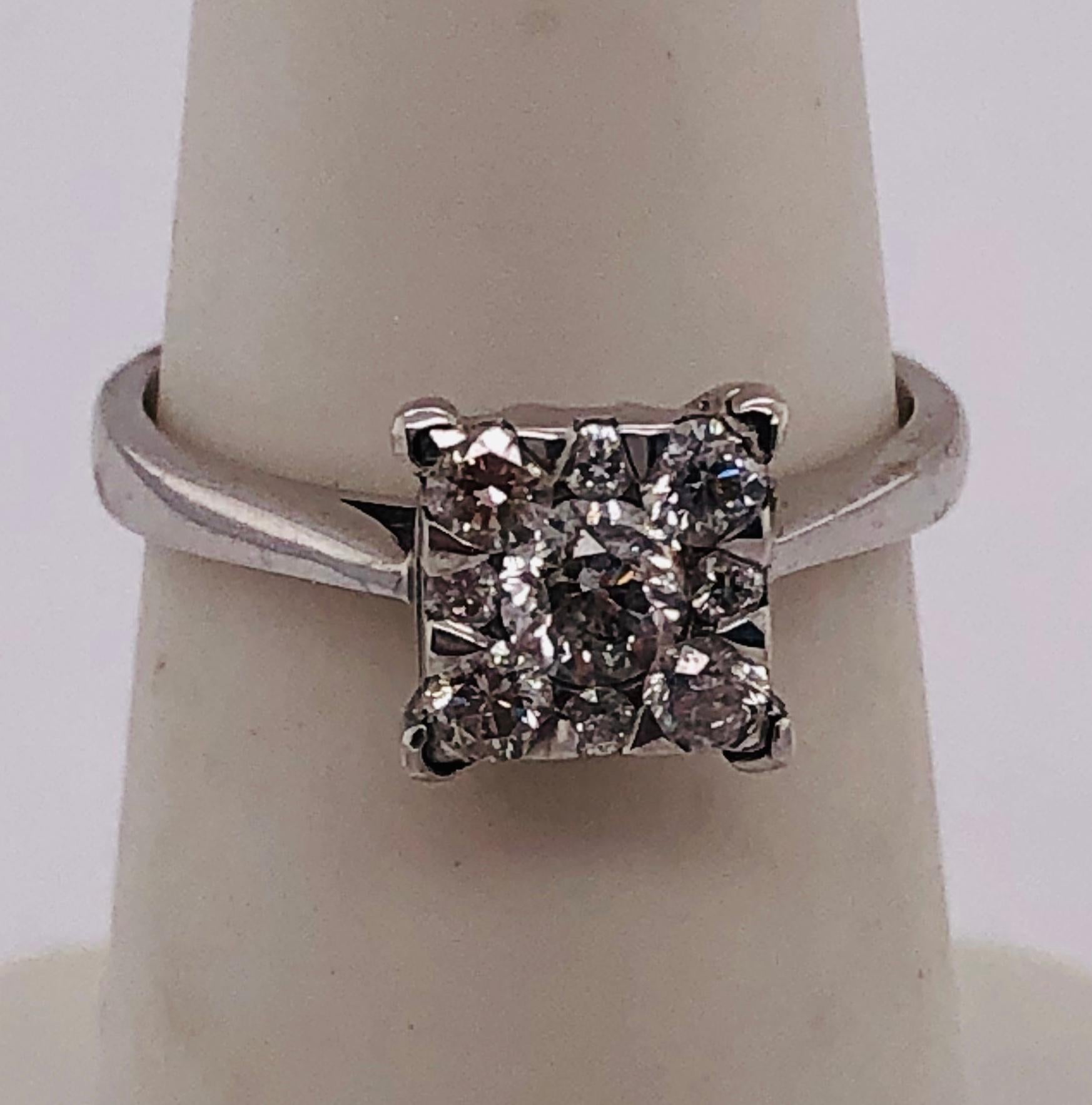 14 Kt White Gold Engagement Bridal Ring with Diamonds 0.67 Total Diamond Weight
Size 5.5
2.65 grams Total weight
