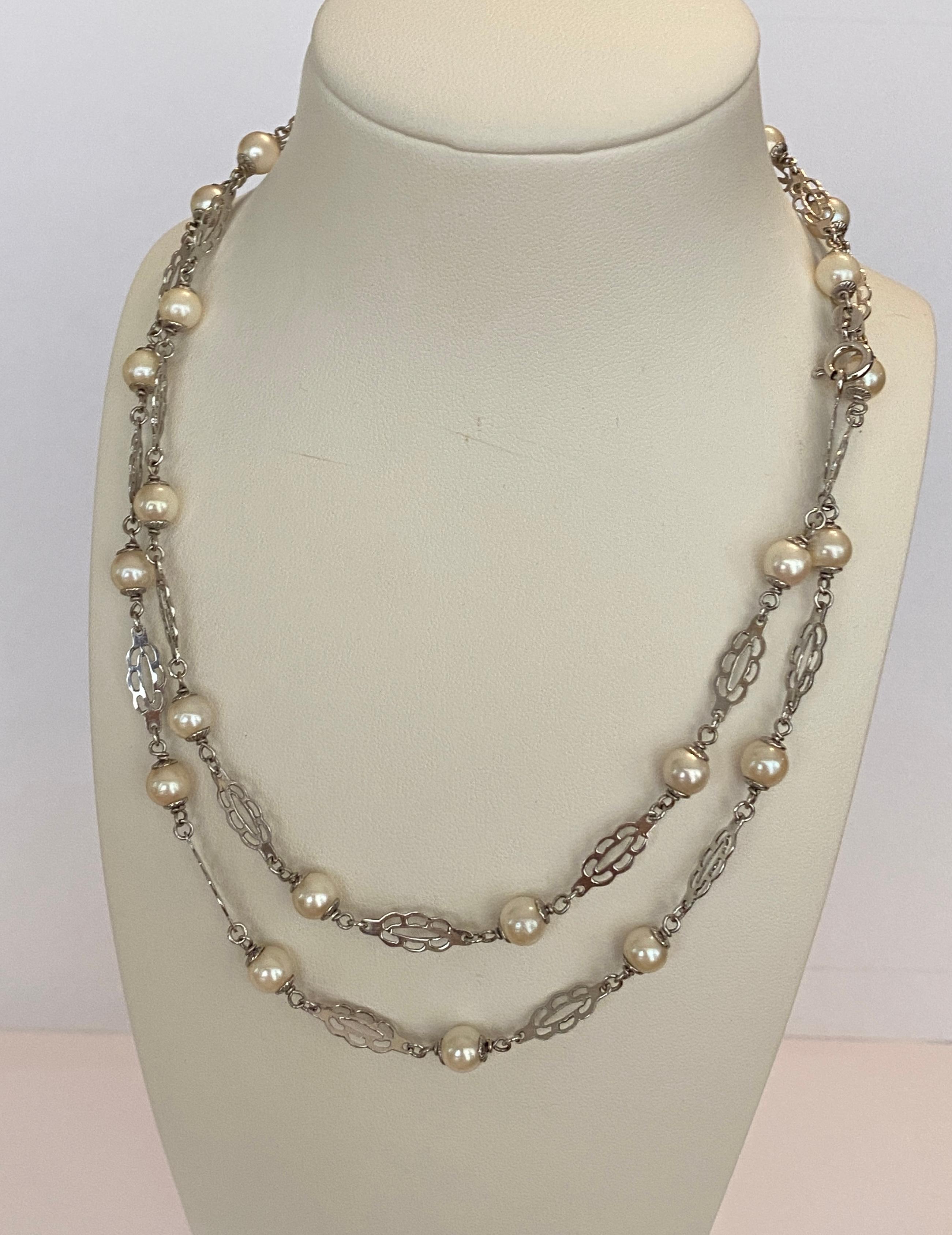 Retro 14 KT White gold necklace Sautoir with pearls For Sale