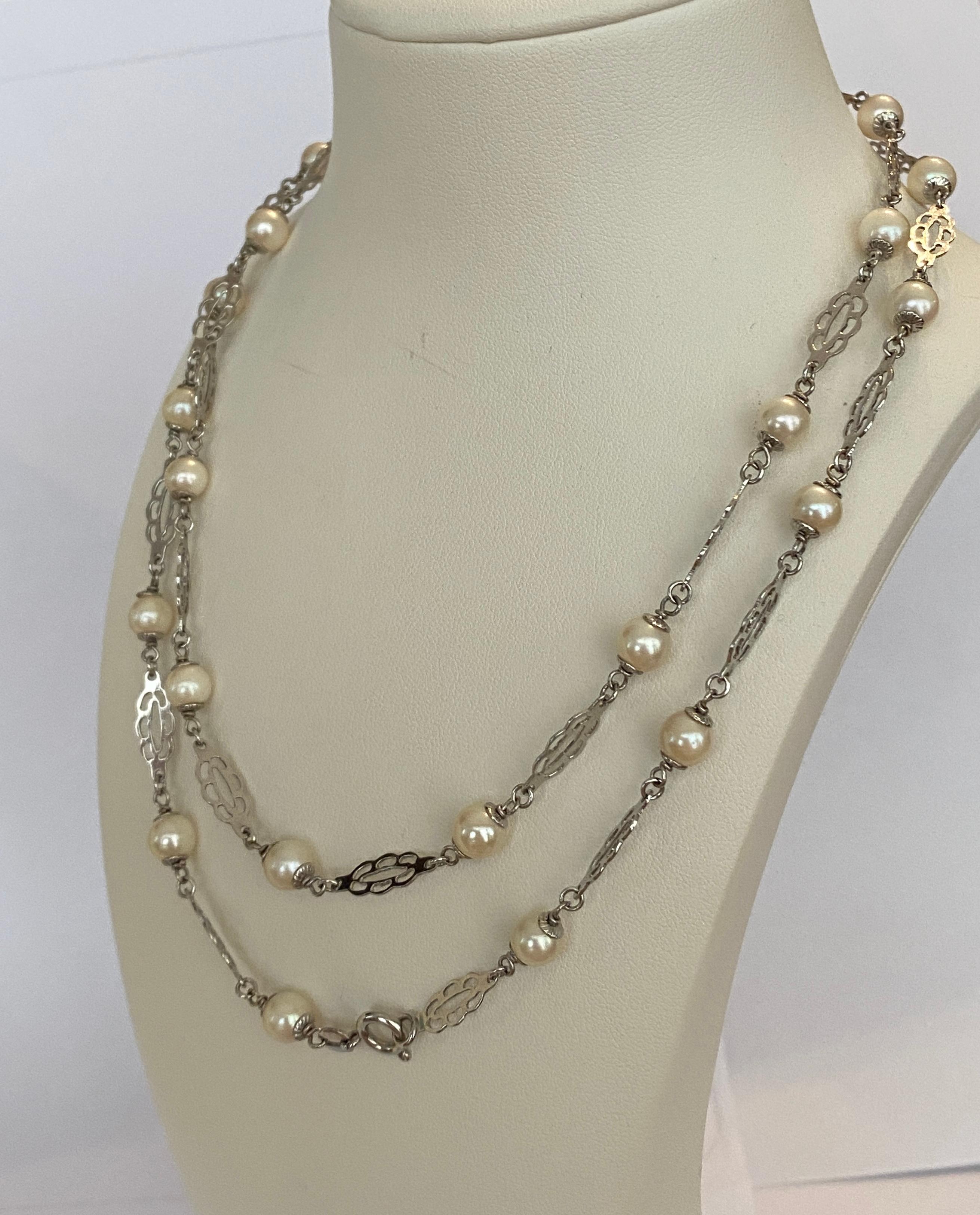 Women's 14 KT White gold necklace Sautoir with pearls For Sale