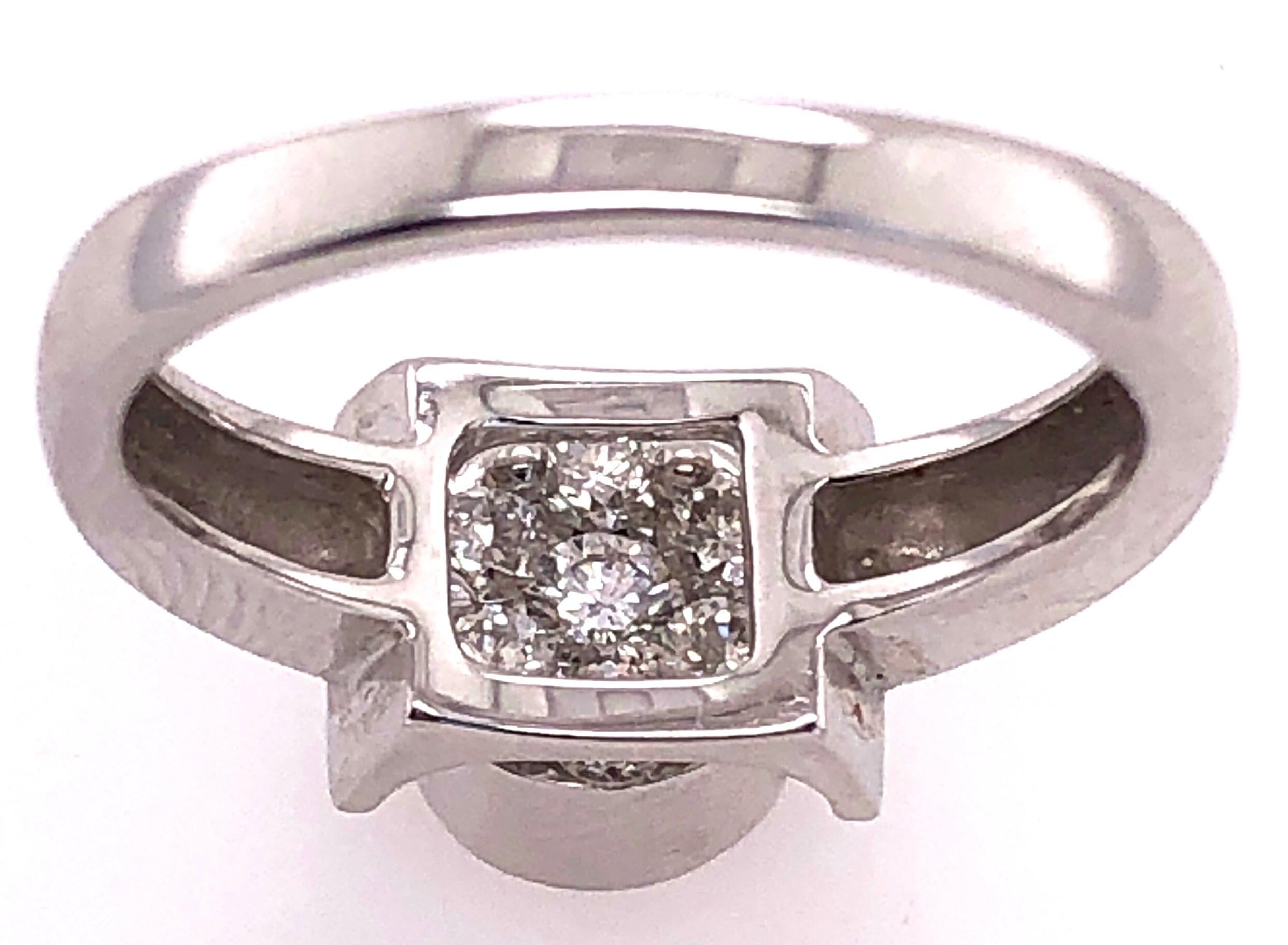 Modern 14 Karat White Gold Reversible Ring with Both Diamonds and Black Sapphires For Sale