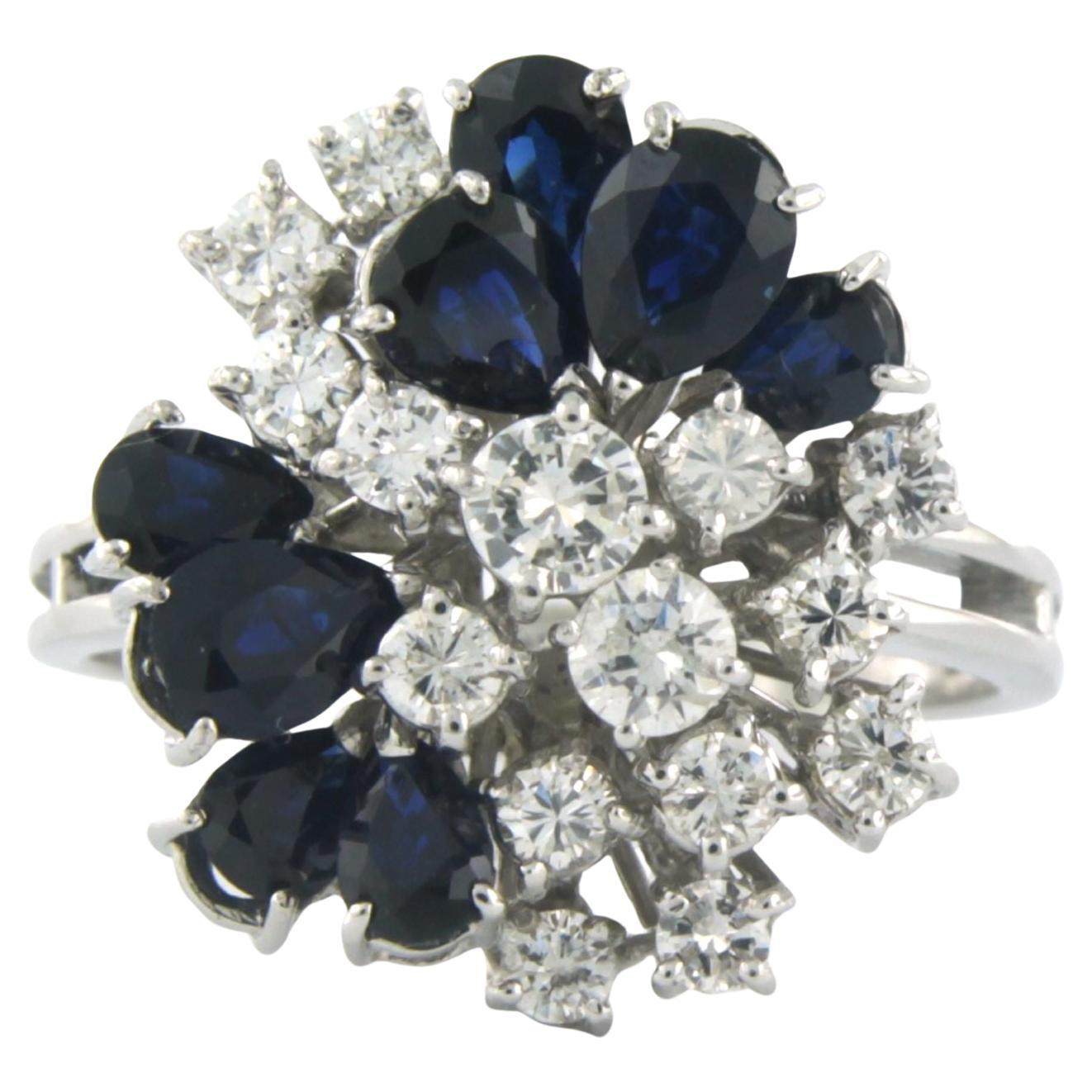 14 kt white gold ring set with sapphire and brilliant cut diamond tot. 1.10 ct For Sale
