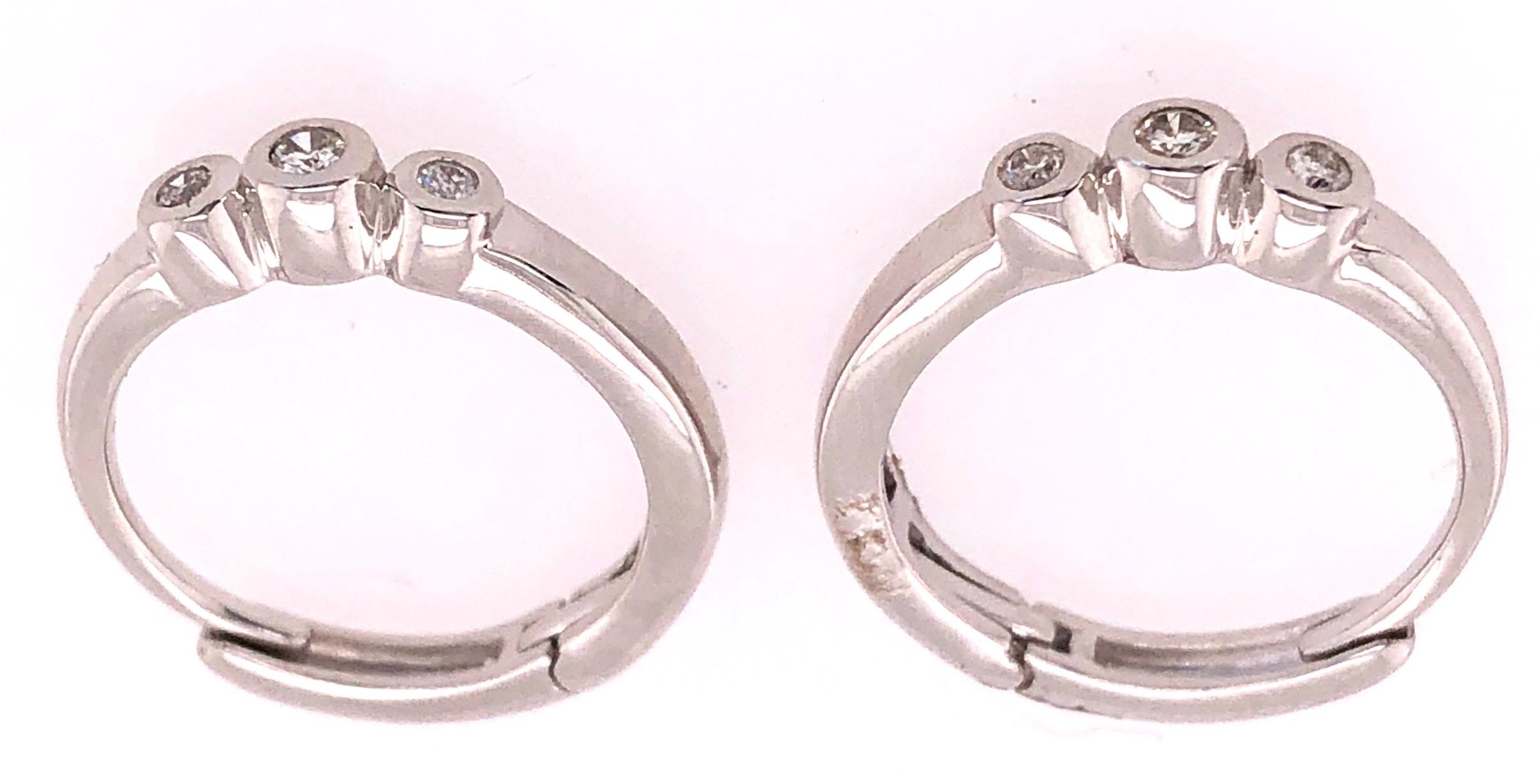 14 Karat White Gold Three Diamond Hoop Earrings In Good Condition For Sale In Stamford, CT