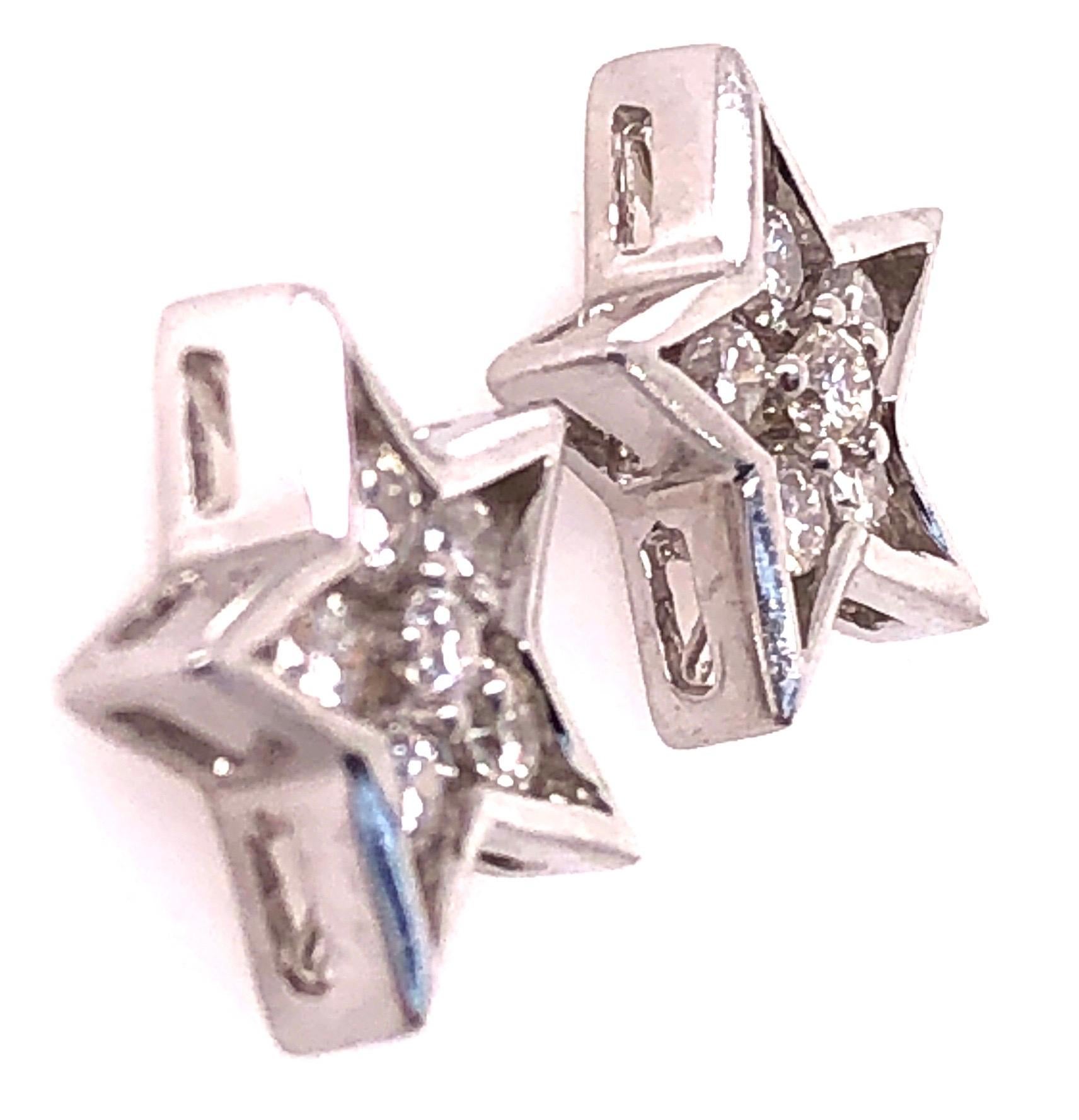 14Kt White Gold Star Earrings 0.50 Total Diamond Weight.
2.51 grams total weight.