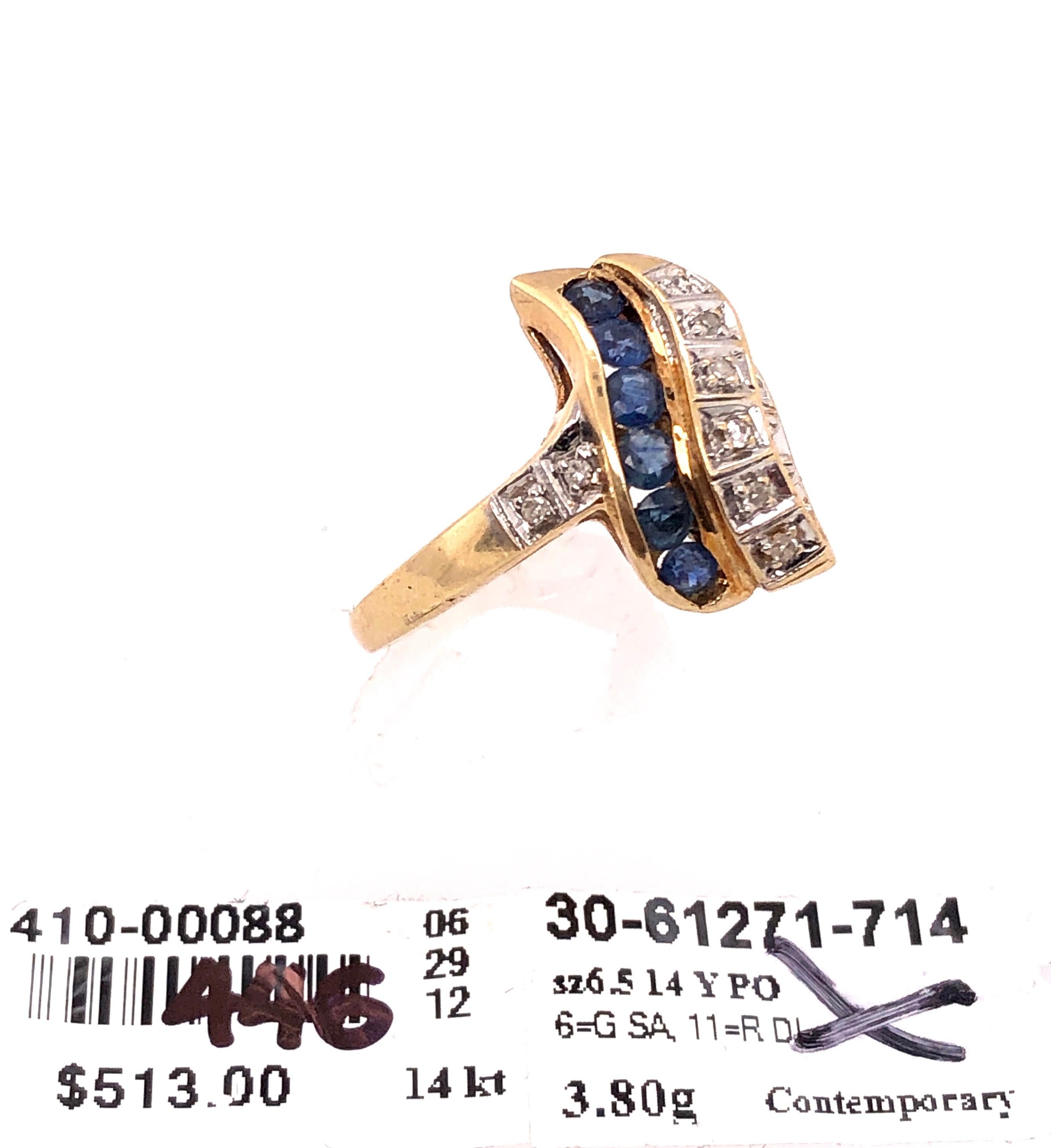 14 Karat Yellow and White Gold Blue Sapphire and Diamond Contemporary Ring For Sale 3