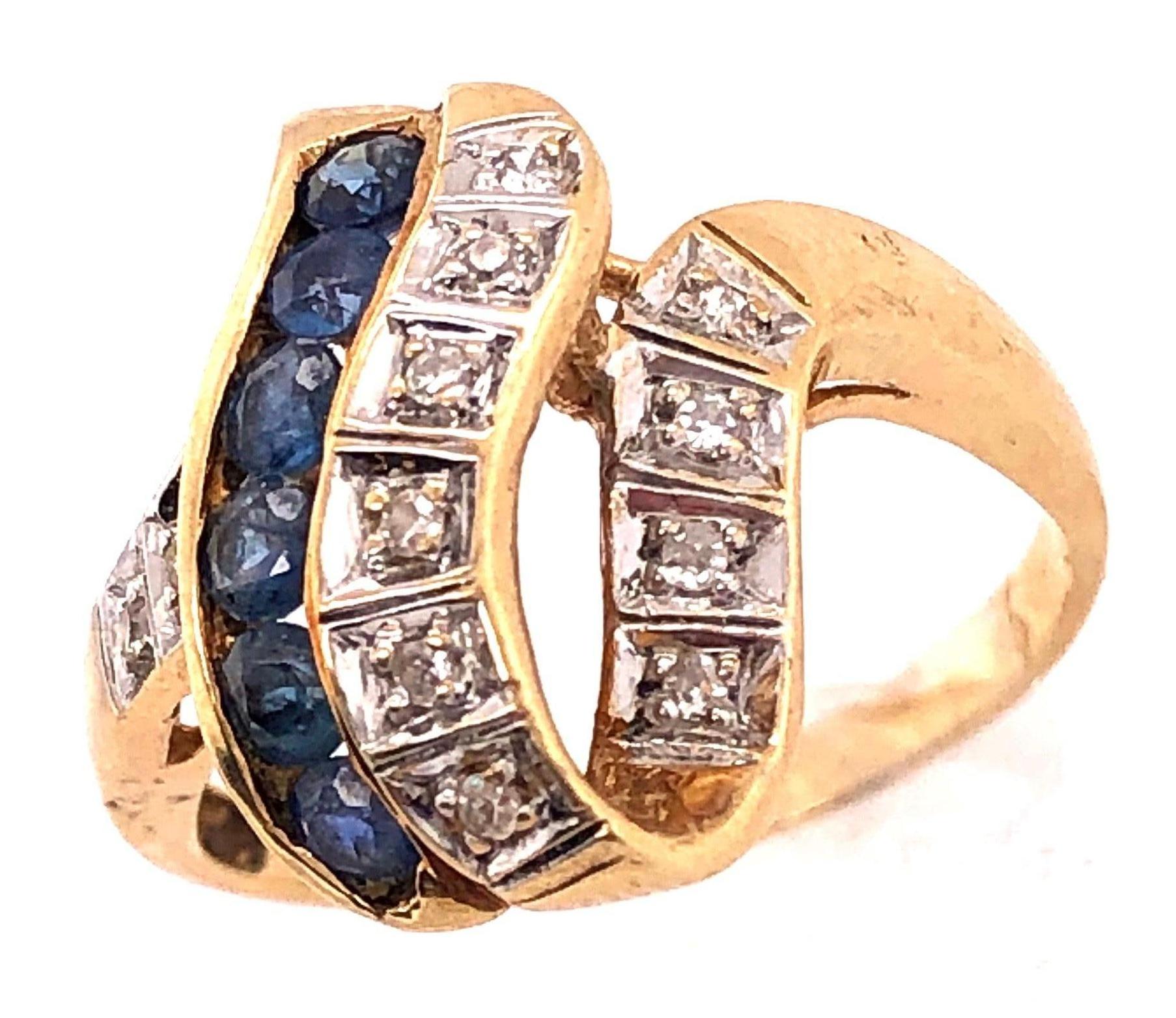 Zeitgenössischer Ring aus 14 Karat Gelb- und Weißgold mit blauem Saphir und Diamant (Moderne) im Angebot