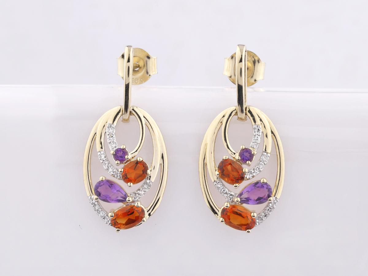 Materiale:  Oro giallo 14KT
Peso dell'oro: 3,30 grammi
Dimensioni dell'orecchino: 2,5 cm
Incastonato con : Diamanti e Ametista con Citrino
A. Stone : 28 diamanti naturali

Pietra preziosa : 8 Ametista con Citrino

Carati di diamante: 0,13
Carato