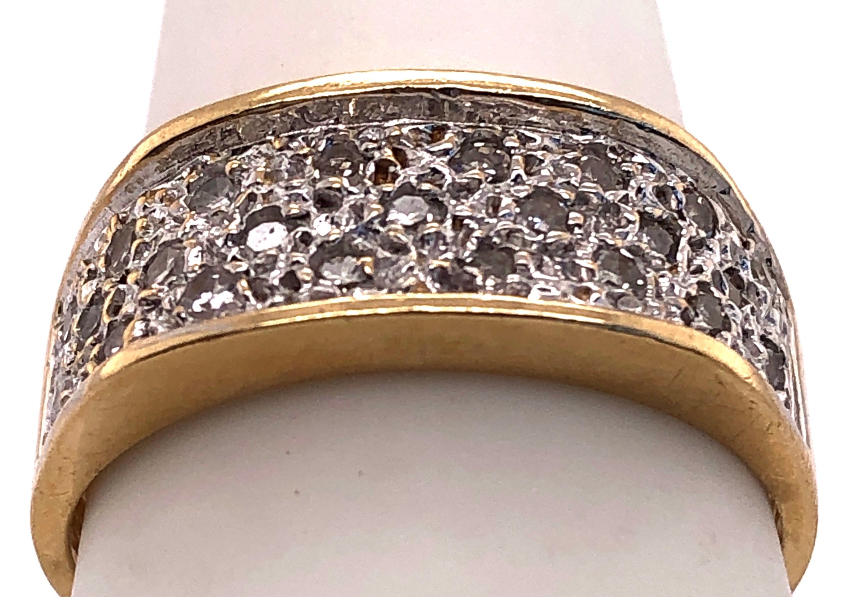 14 Kt Yellow Gold And Diamond Encrusted Fashion Ring 
0.50 Total Diamond Weight.
Size 7.5 with 4 grams total weight.