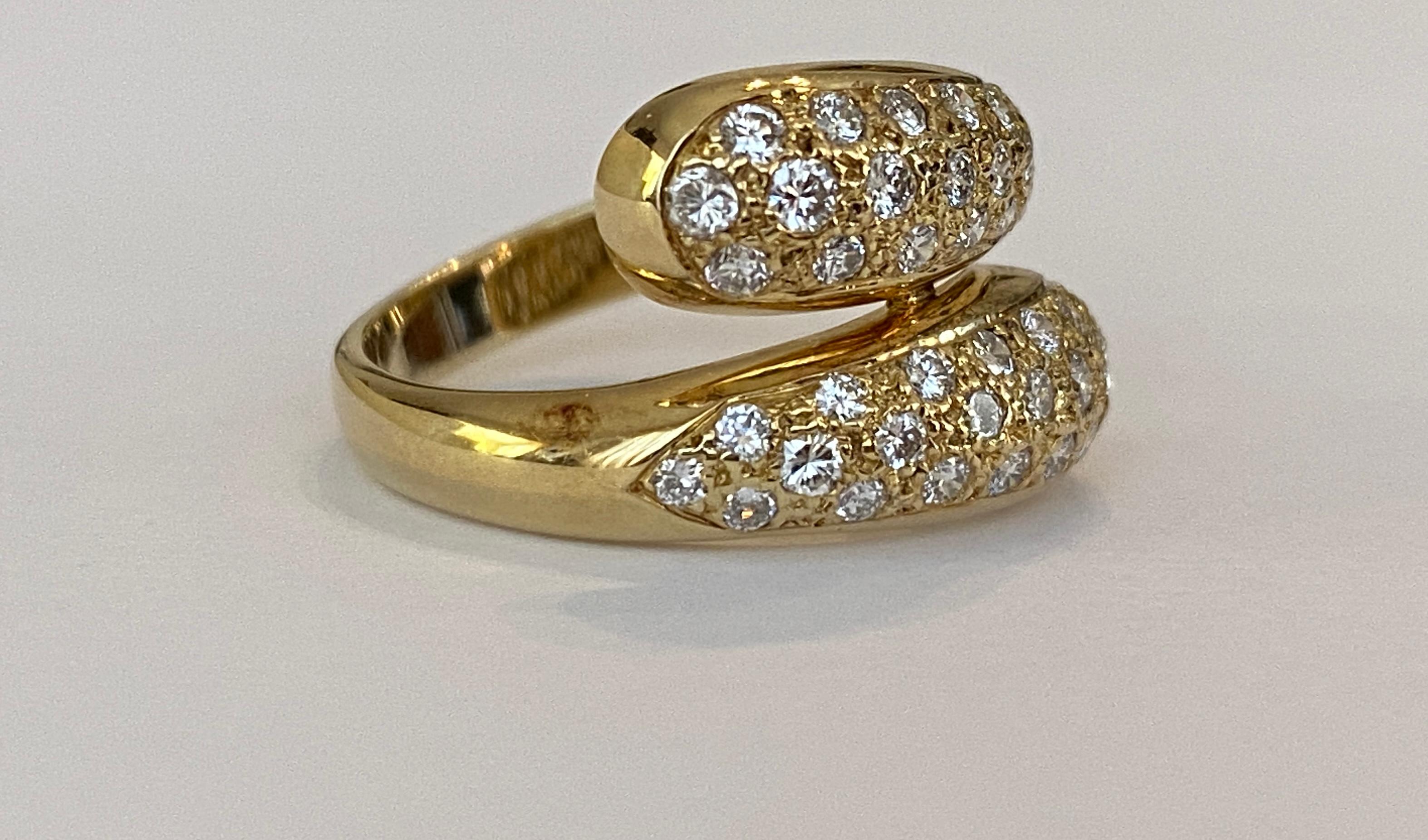 On offer is a 14 karat yellow gold ring decorated with 45 pieces of pave set brilliant cut diamonds of approx. 0.80 ct in total, of quality G/VS/SI.
Gold content: 585 (hallmarked)
Weight: 5.1 grams
Height of the ring: 14mm, width: 19mm
Ring Size: