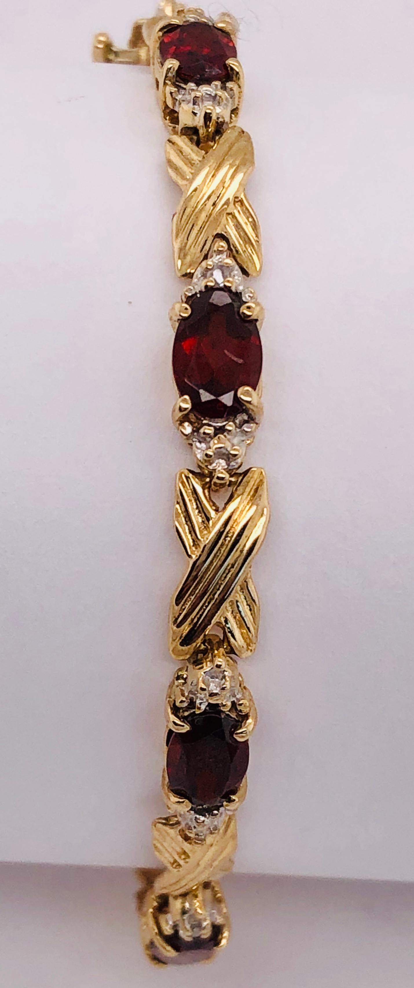 Women's or Men's 14 Karat Yellow Gold Braided Link Bracelet with Garnets and Diamond Accents For Sale